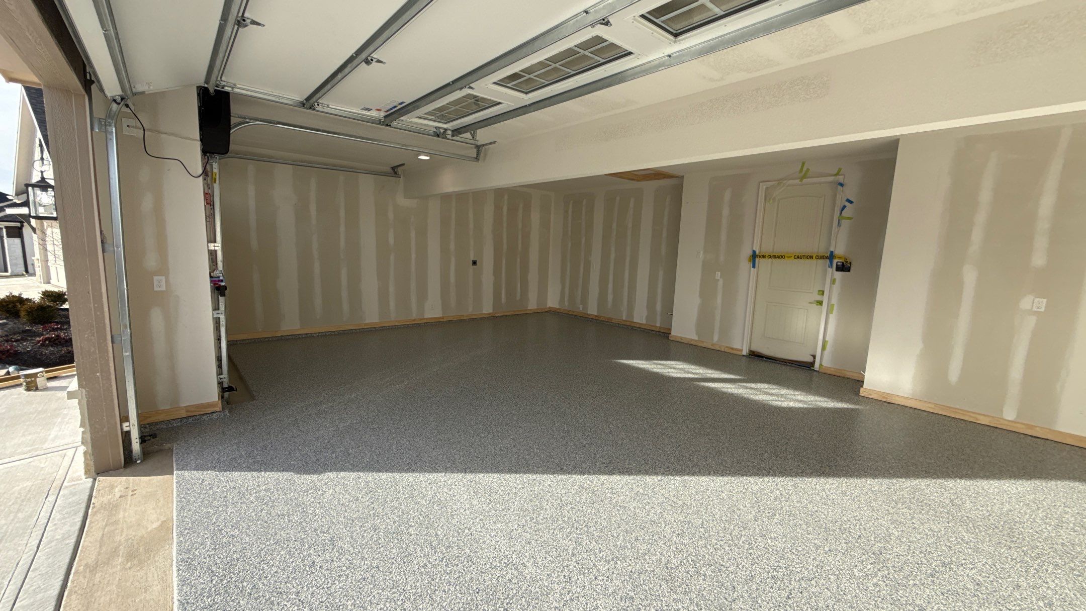 New floor for Dusty Rhodes homes in Raymore! by Banner Garage