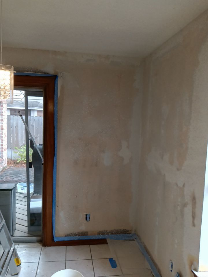 Interior and exterior painting project by Roof Concepts Construction