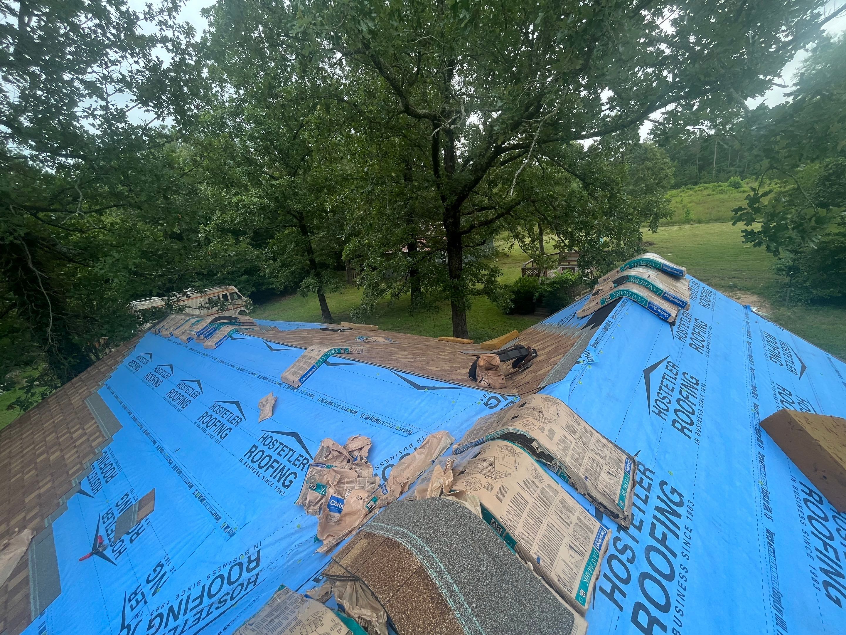 Storm Restoration Reroof: 25 Year 3-Tab Shingle by Hostetler Roofing
