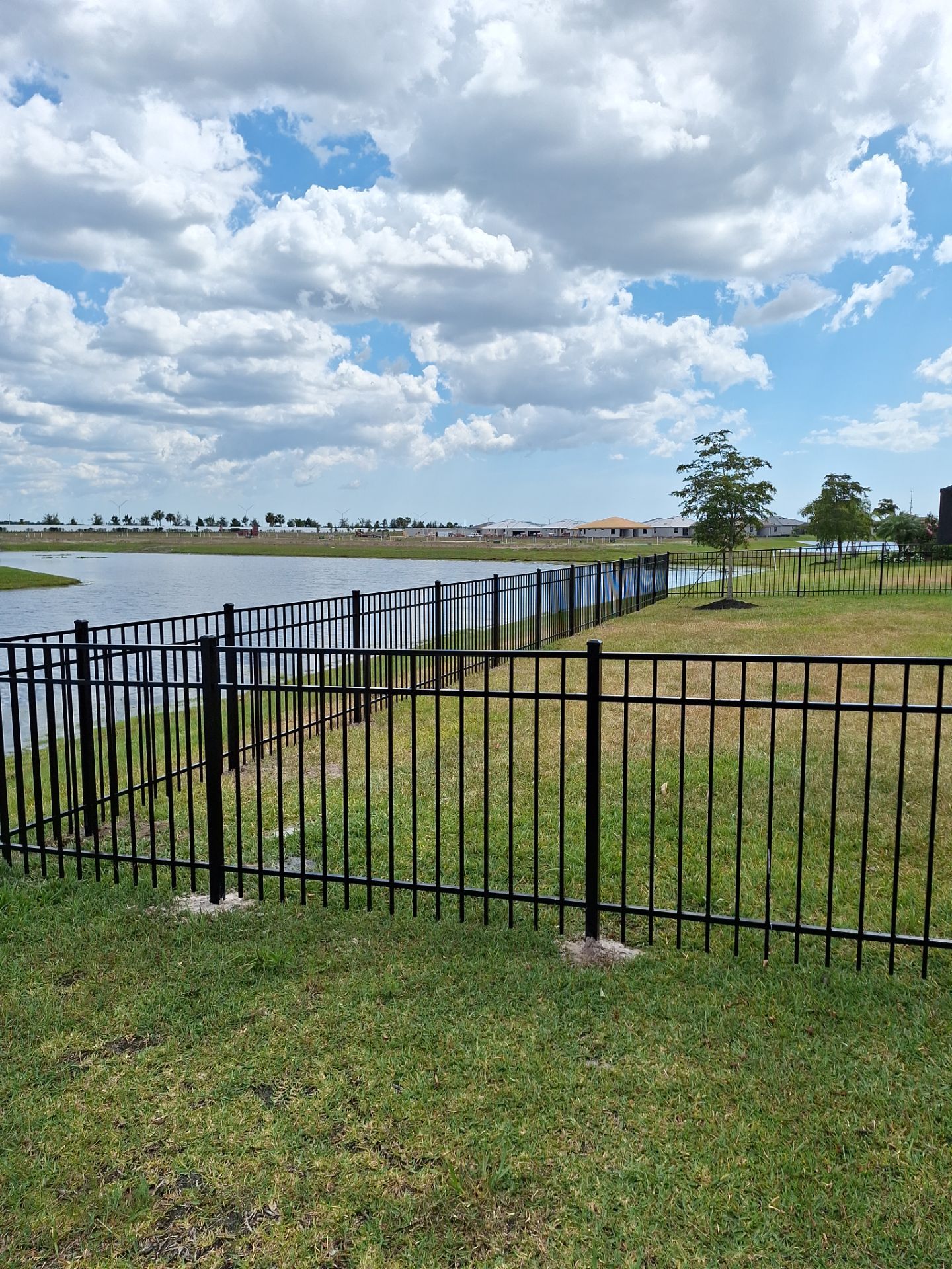 Aluminum Fence Installation using Black 3 Rail Aluminum Fence by Asap fence and gates, LLC