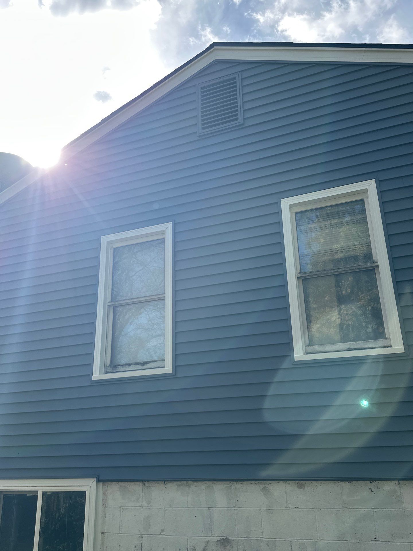 Feeling Blue in Weston Mo - Time for a Makeover by EEC Windows, Siding & Roofing