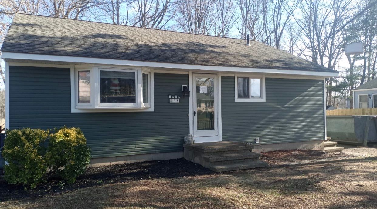 Siding Installation using Certainteed Mainstreet Forest Green by A Plus Exterior