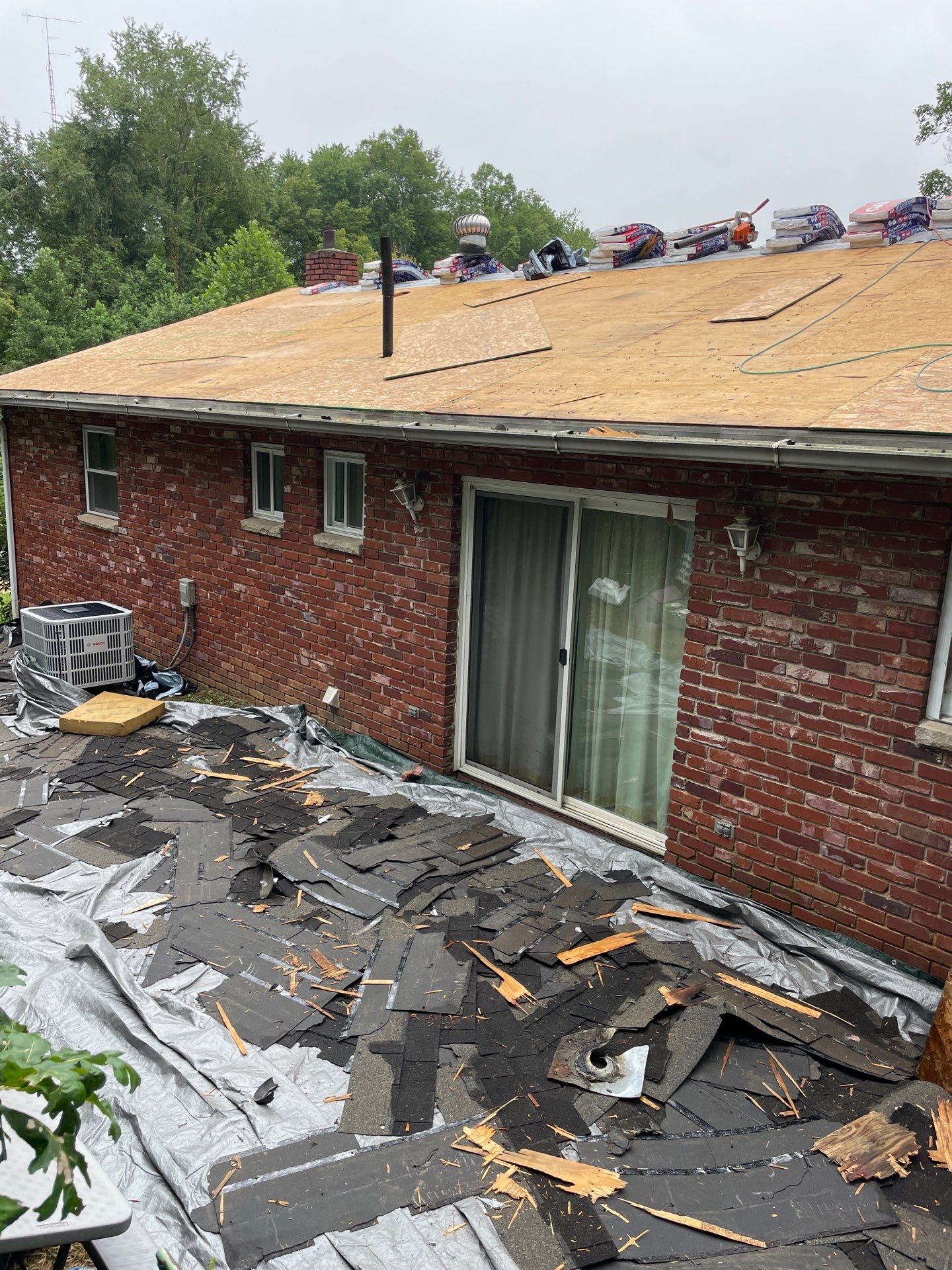 Residential Roofing Installation using GAF Timberline HDZ Charcoal by Rainstoppers Roofing