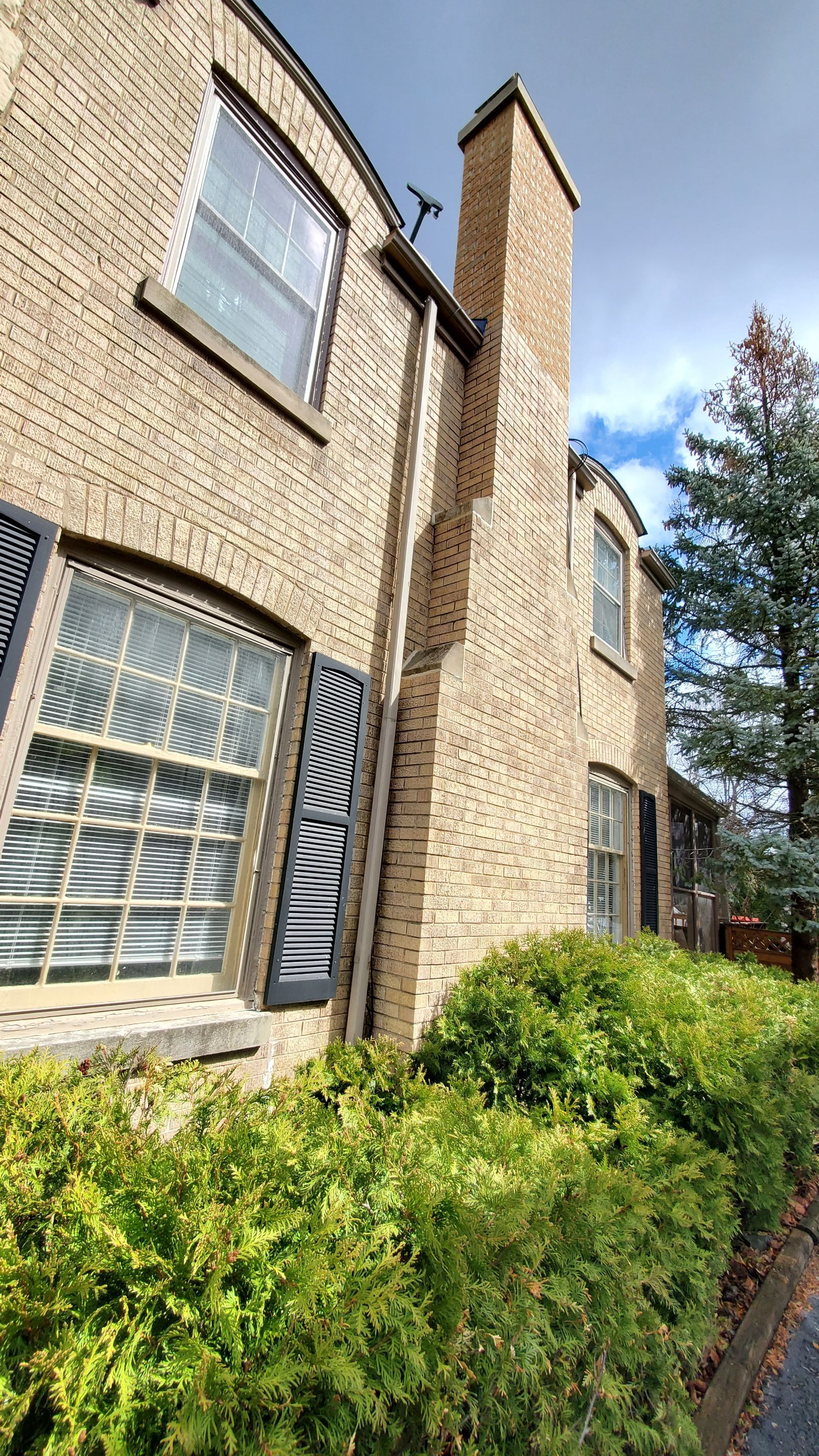 Wood cleaning and staining using Armstrong cloark oil stain by Northern Power Washing LLC.