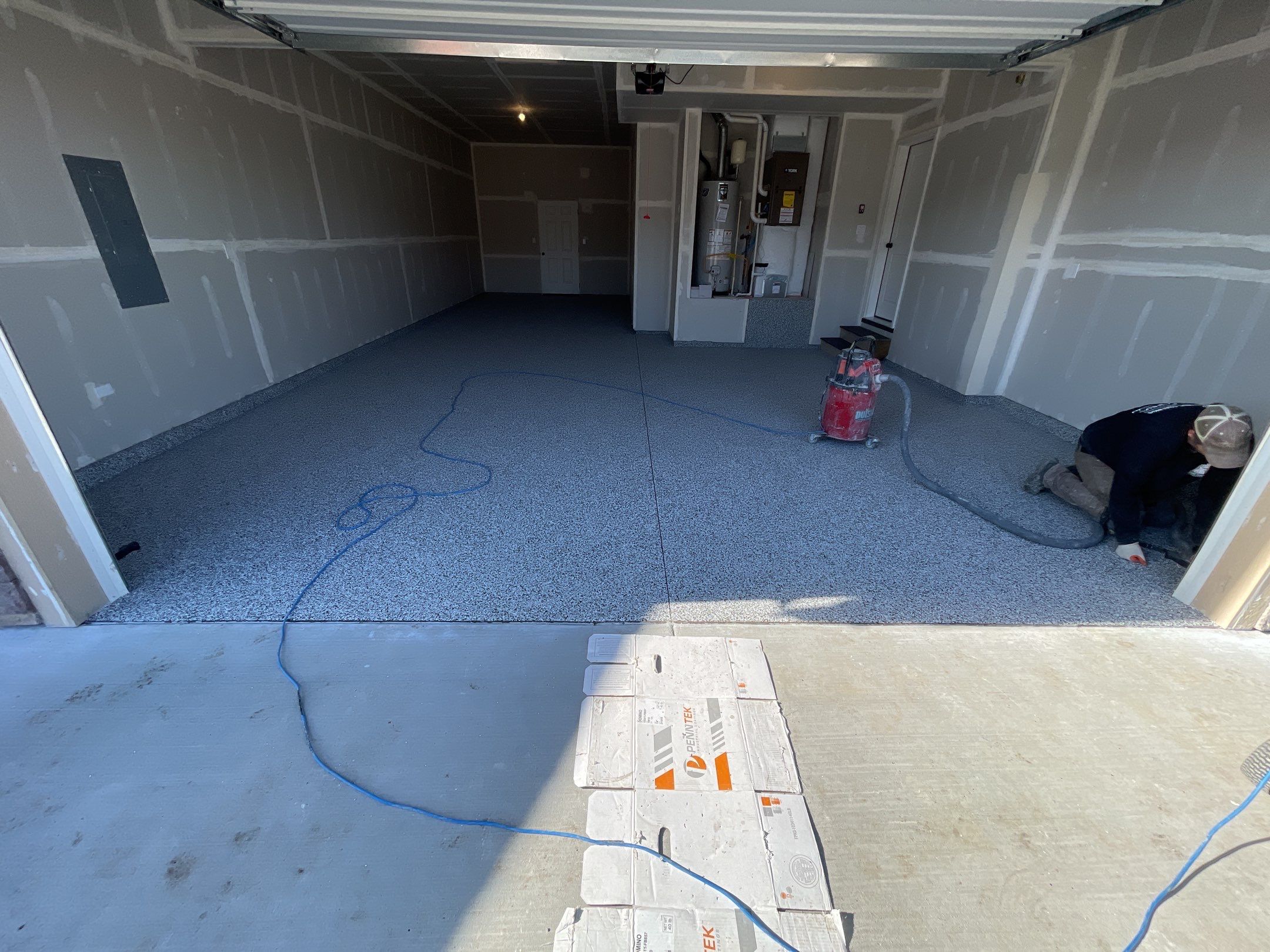 Garage Transformation using Domino by Croc Coatings, LLC