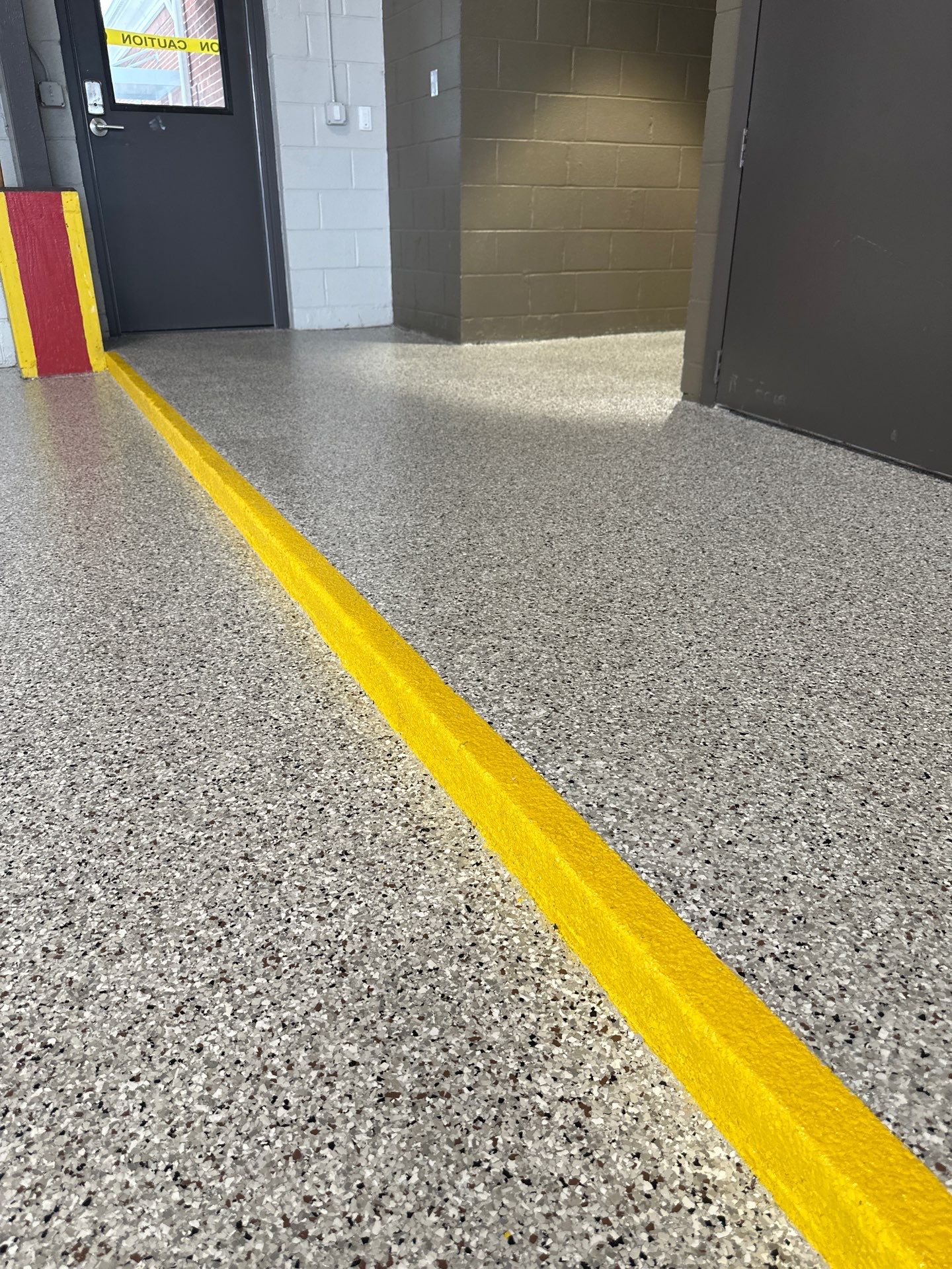 Commercial Floor Coating using Coyote by My Garage Floor Guys