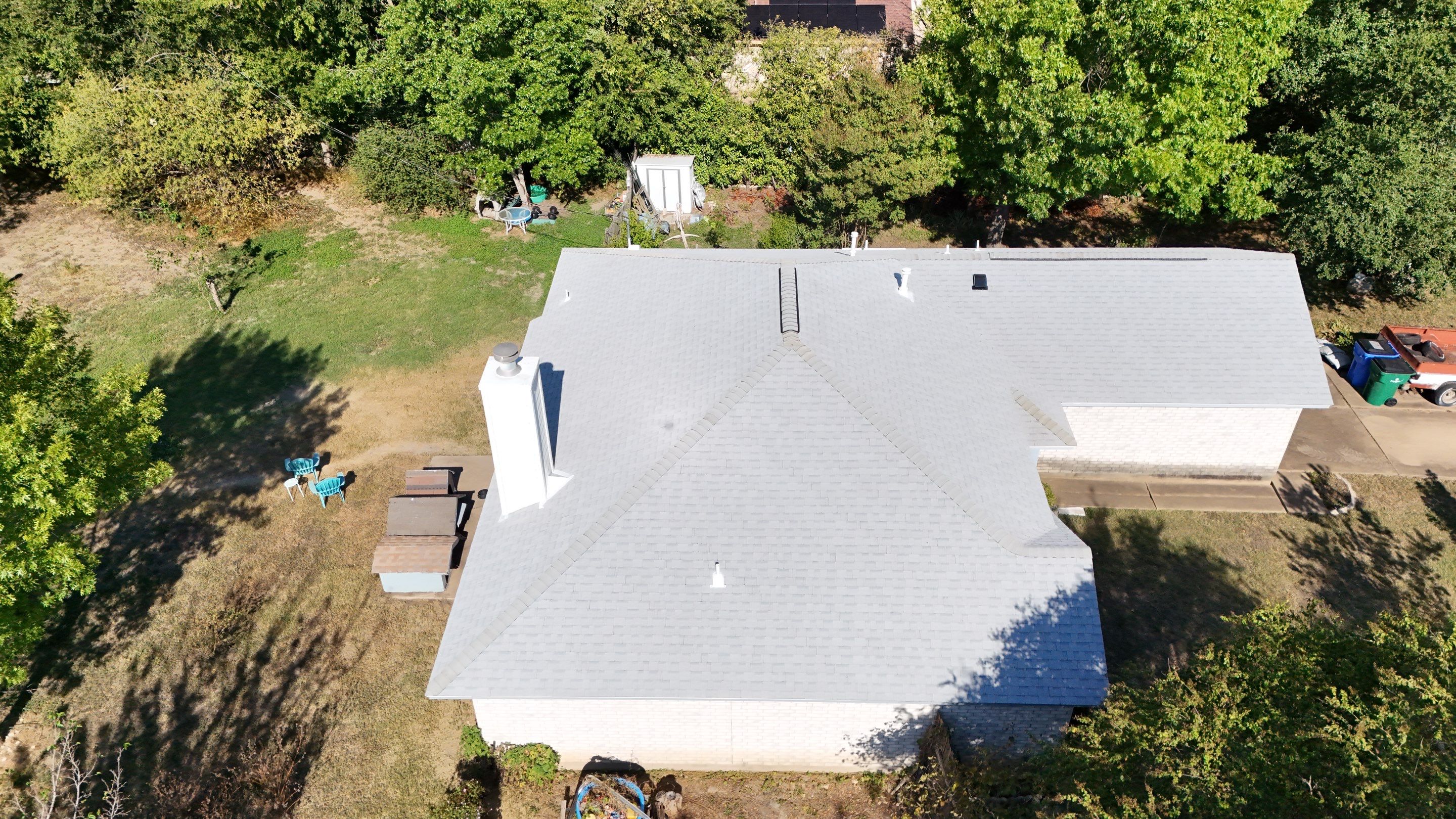 Residential Roof Replacement using Owens Corning - Duration - Shasta White by Action Exteriors Austin