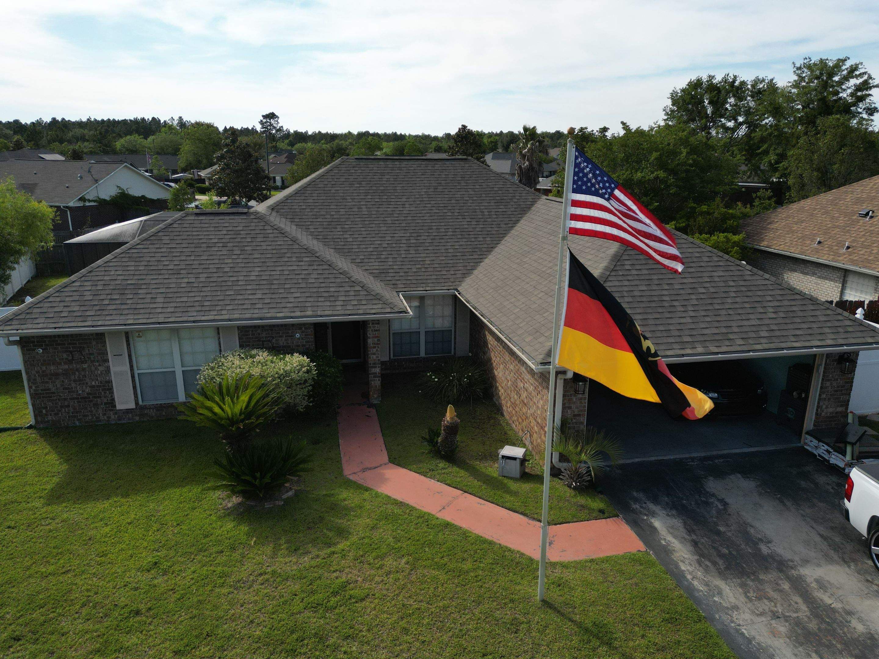 Residential Roofing Installation using Atlas Pinnacle Sun by Talya Roofing