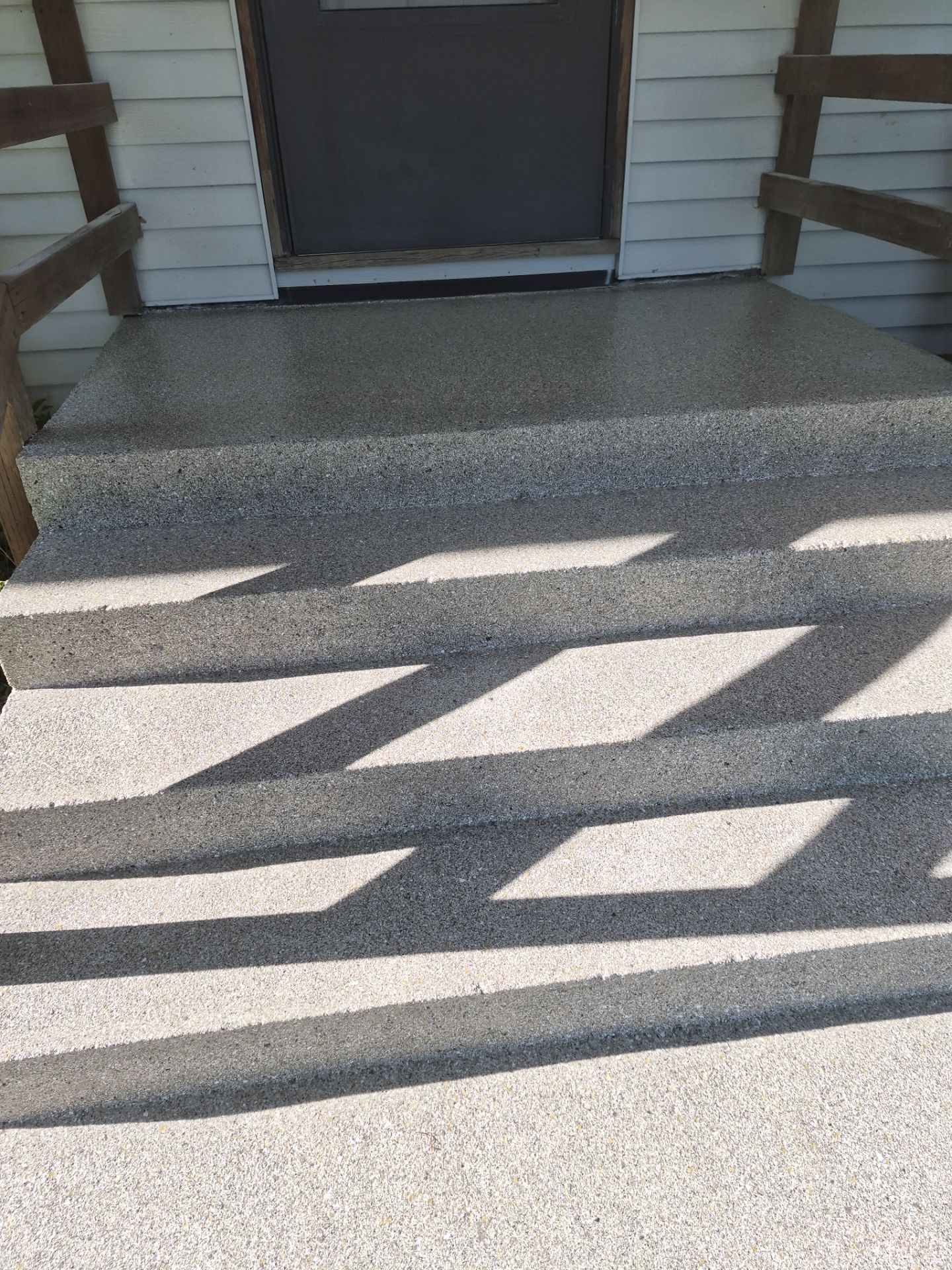Quartzite Hybrid Concrete Patio and Walkway Coating in Priest River by Croc Coatings, LLC