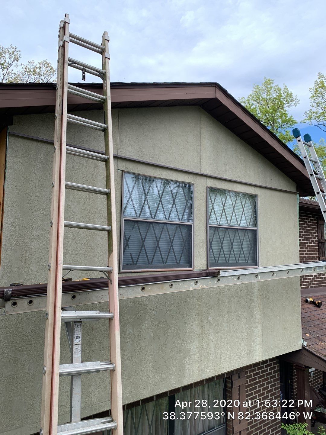 Old to New Tudor Style Fiber Cement Update  by Secure Construction Company Inc