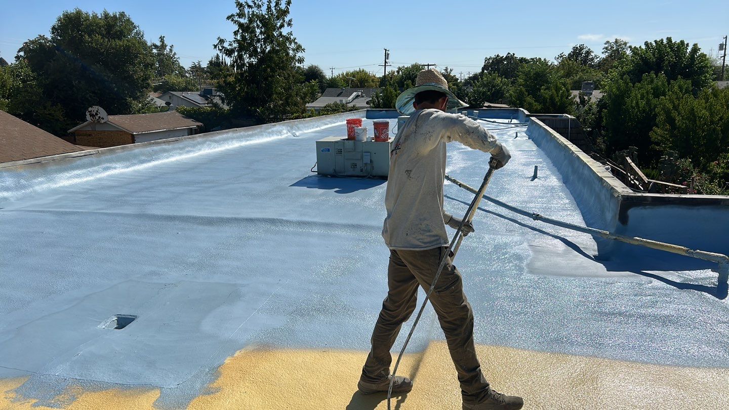 Foam Refurbish using Conklin Benchmark/PUMA XL coatings and spray foam; Also metal roofing around parapet wall by Straight Edge Roofing Inc