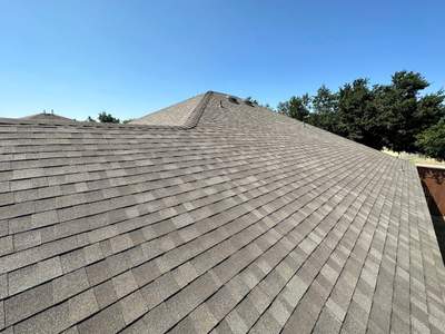 Driftwood Oakridge Roofing at a Round Rock Brick Home