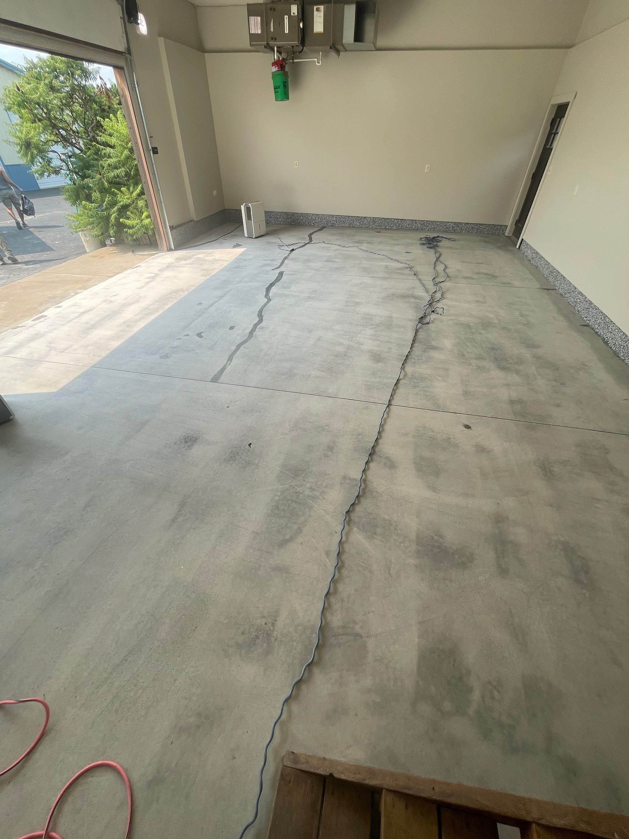 Domino Flake Floor Coating and Crack Repair in Chancellor by Select Painting, Coatings & Garage Cabinets