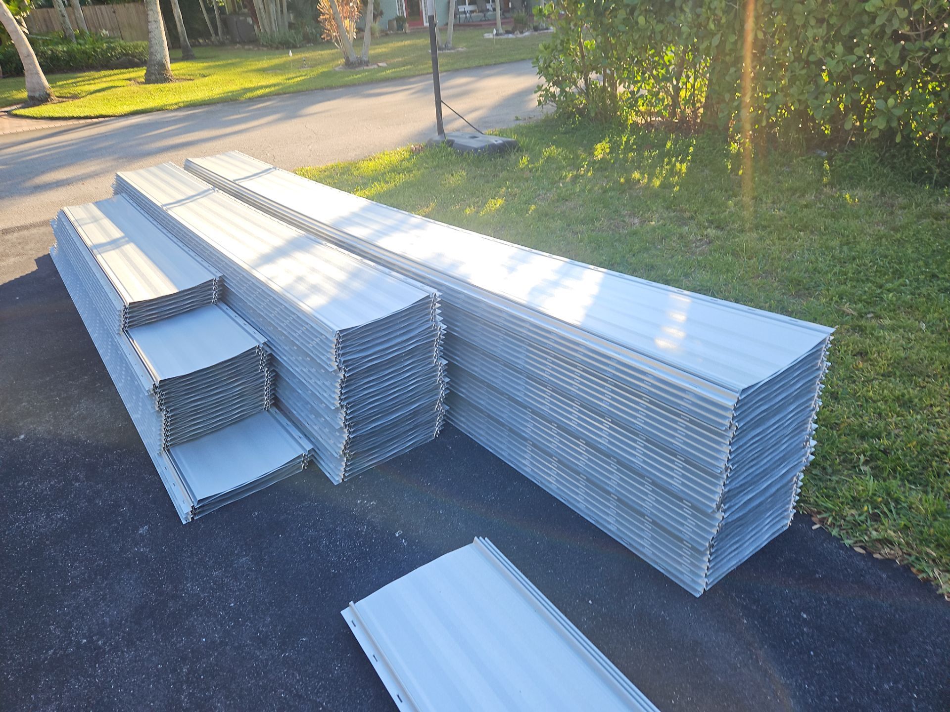 Residential Roofing Installation using 1" Nail strip metal roof by BLUES BROTHERS CONSTRUCTION CORP