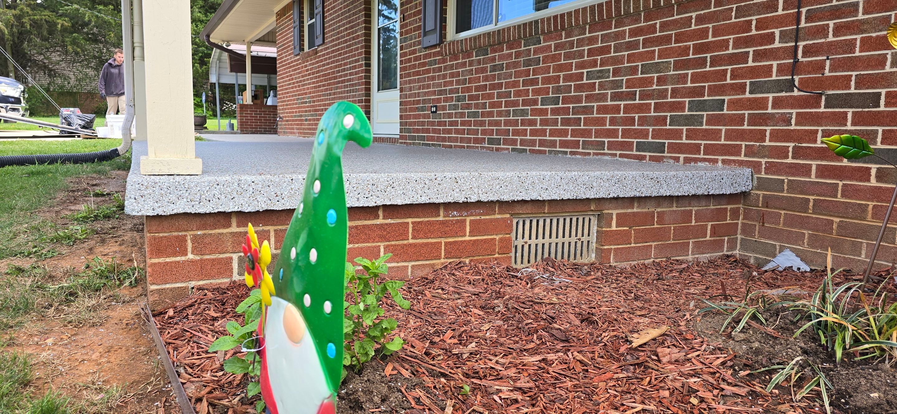 Back Patio using Creekbed by Elite Floor Solutions