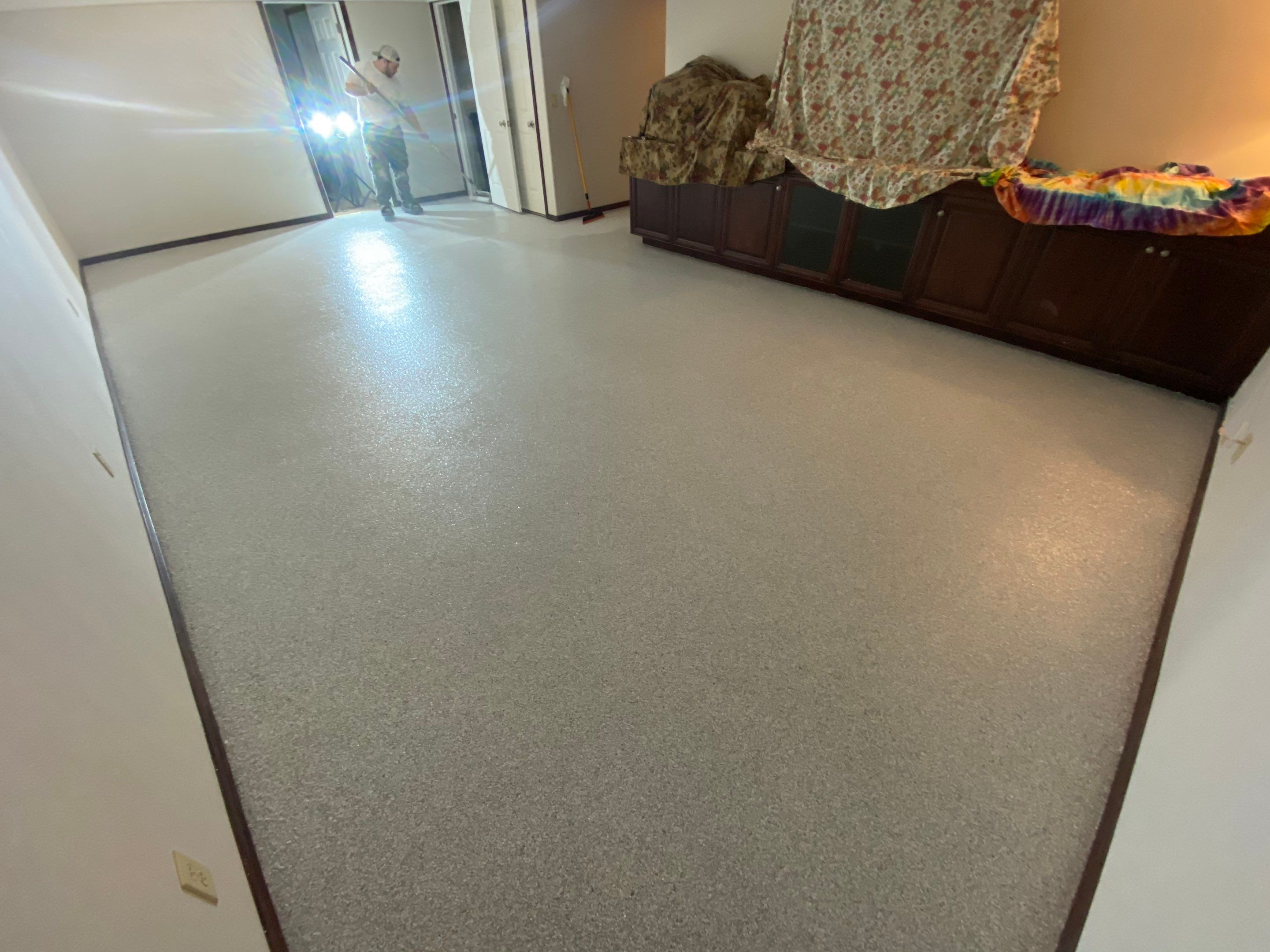 Basement Transformation using Ash Colorway by Croc Coatings, LLC