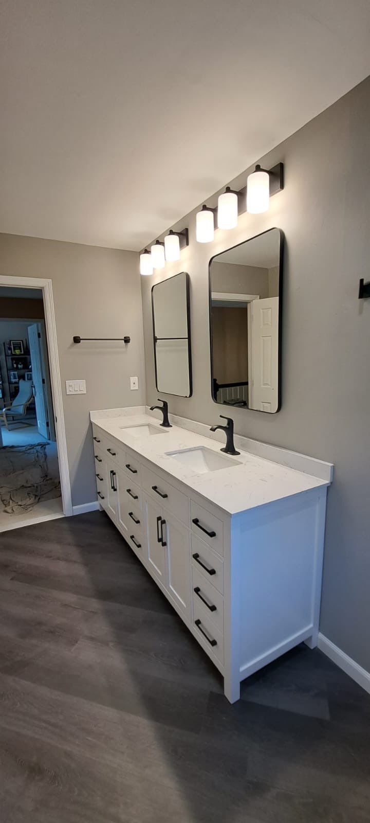 Bathroom Remodel using LVP Flooring by Home Concepts Construction