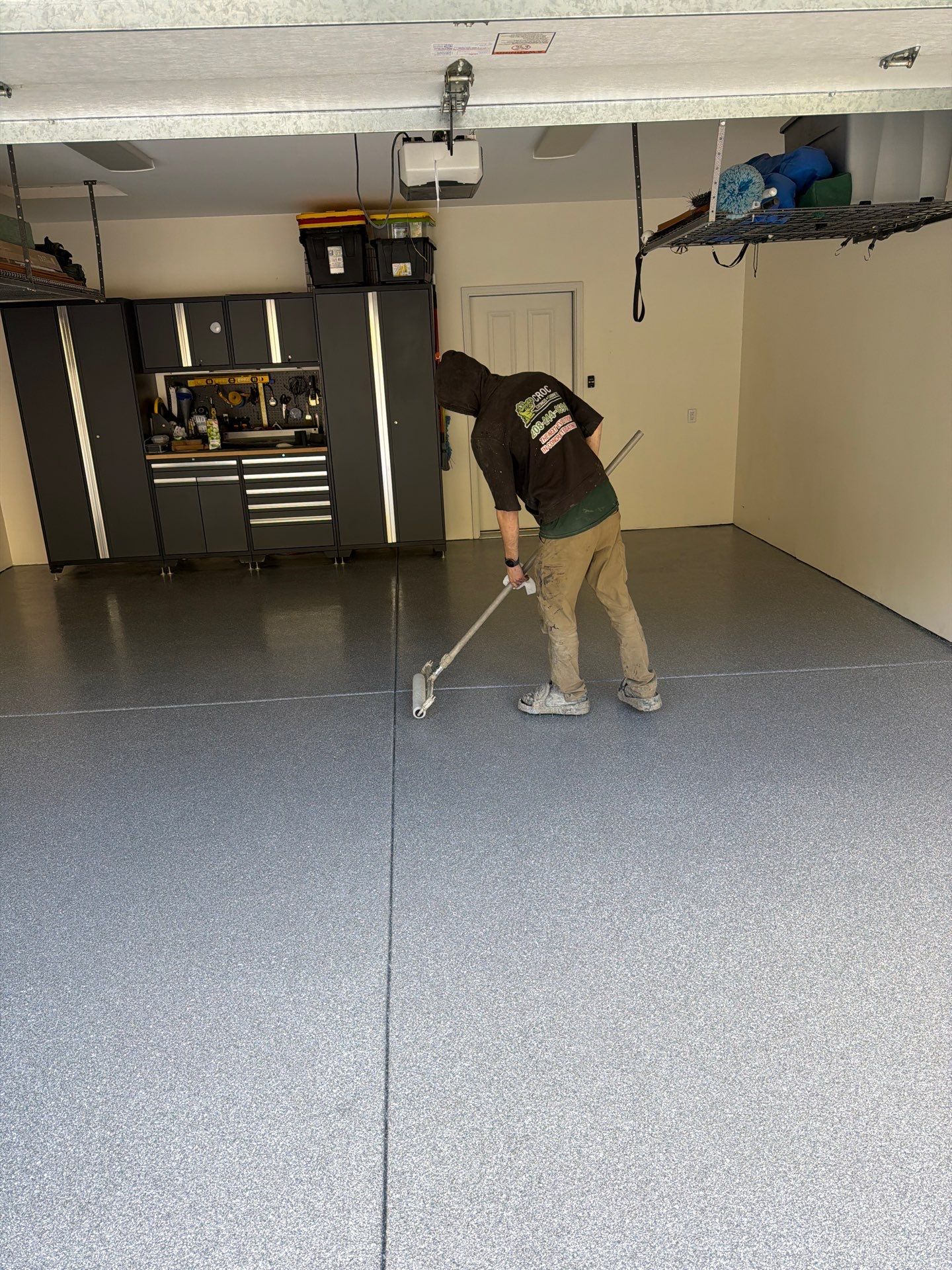 Liberty Lake Garage Transformation with Turquoise Hybrid Polyurea Floor by Croc Coatings, LLC