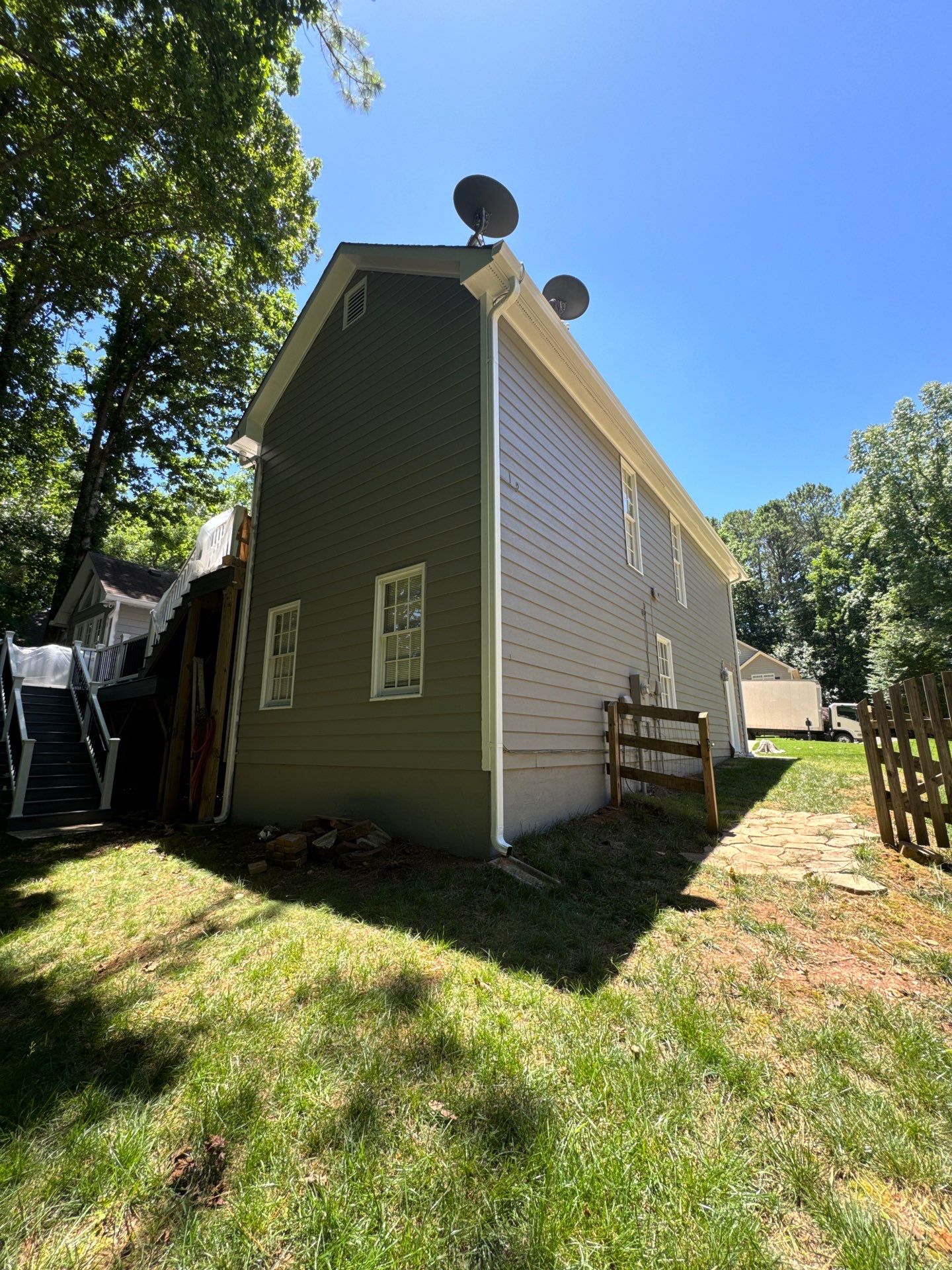 Exterior Painting and Chimney Siding Refresh in Woodstock, Georgia by Swift Home Renovations