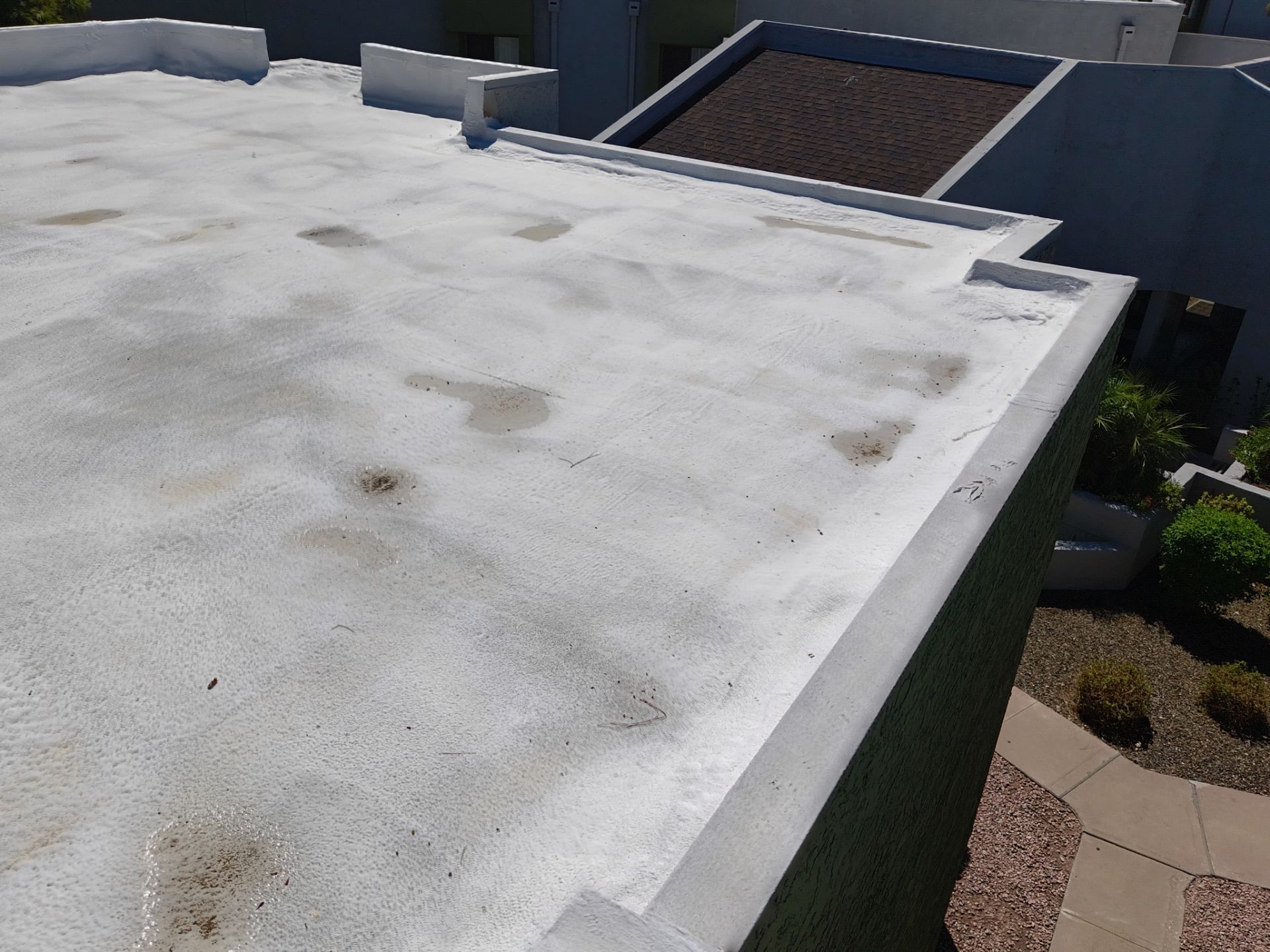 Mesa Apartment Flat Roof Coating and Interior Restoration Services by APM Builders LLC