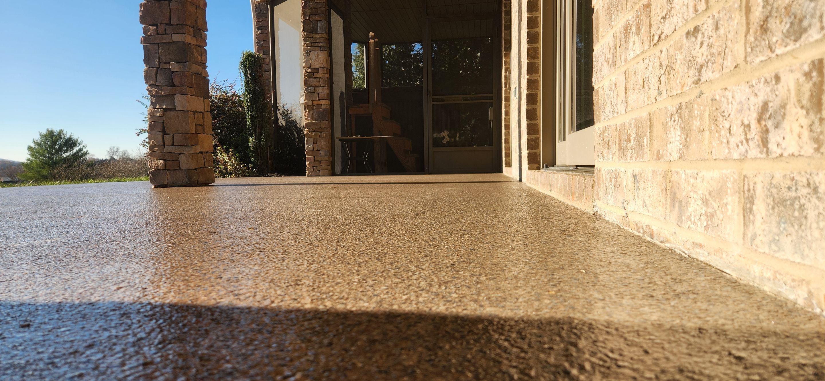 Garage & Back Patio Upgrade with Obsidian & Garnet by Elite Floor Solutions