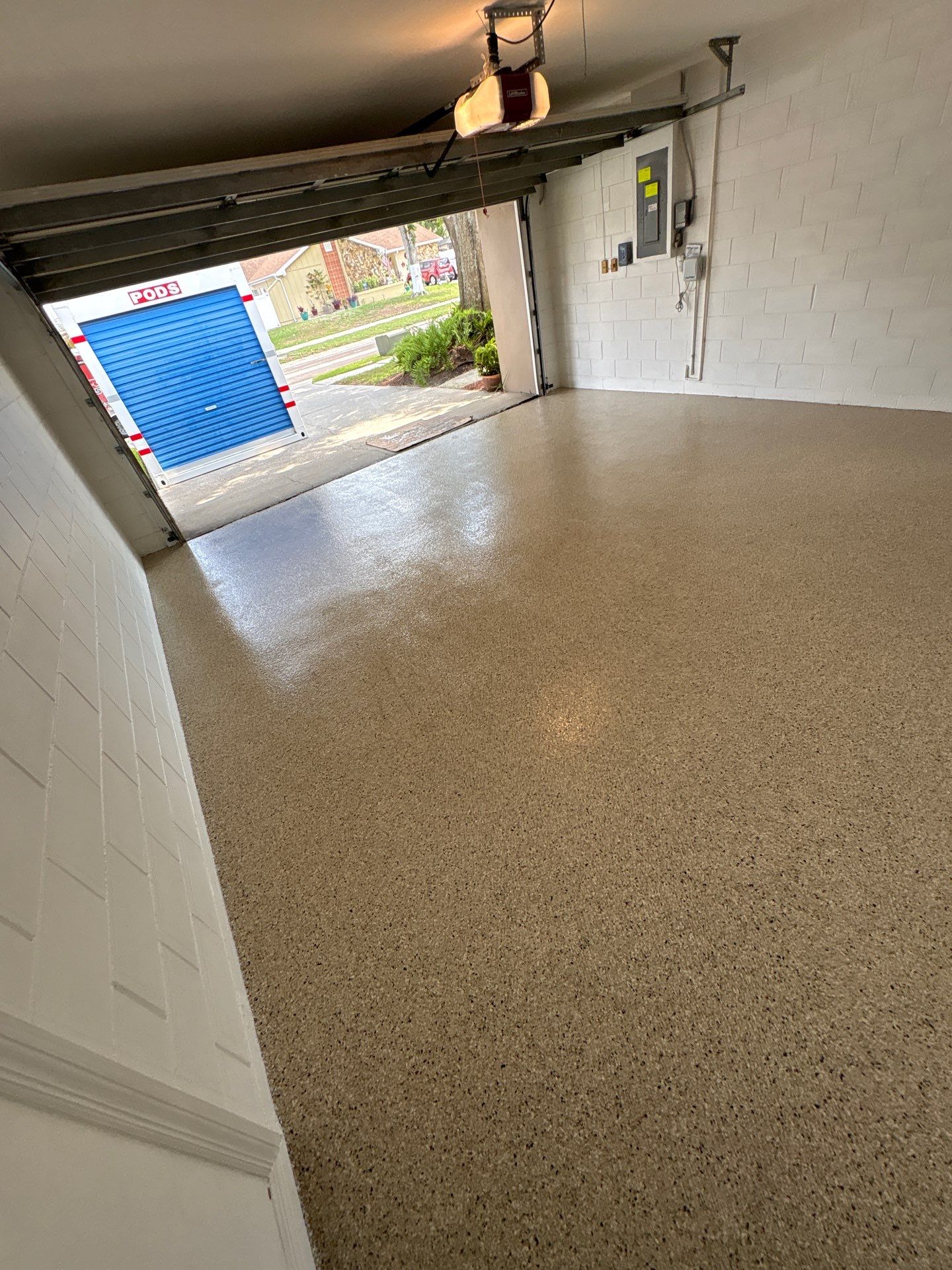 Garage and Screened Lanai Epoxy Floor Coating in Brandon by Performance Floors & Coating