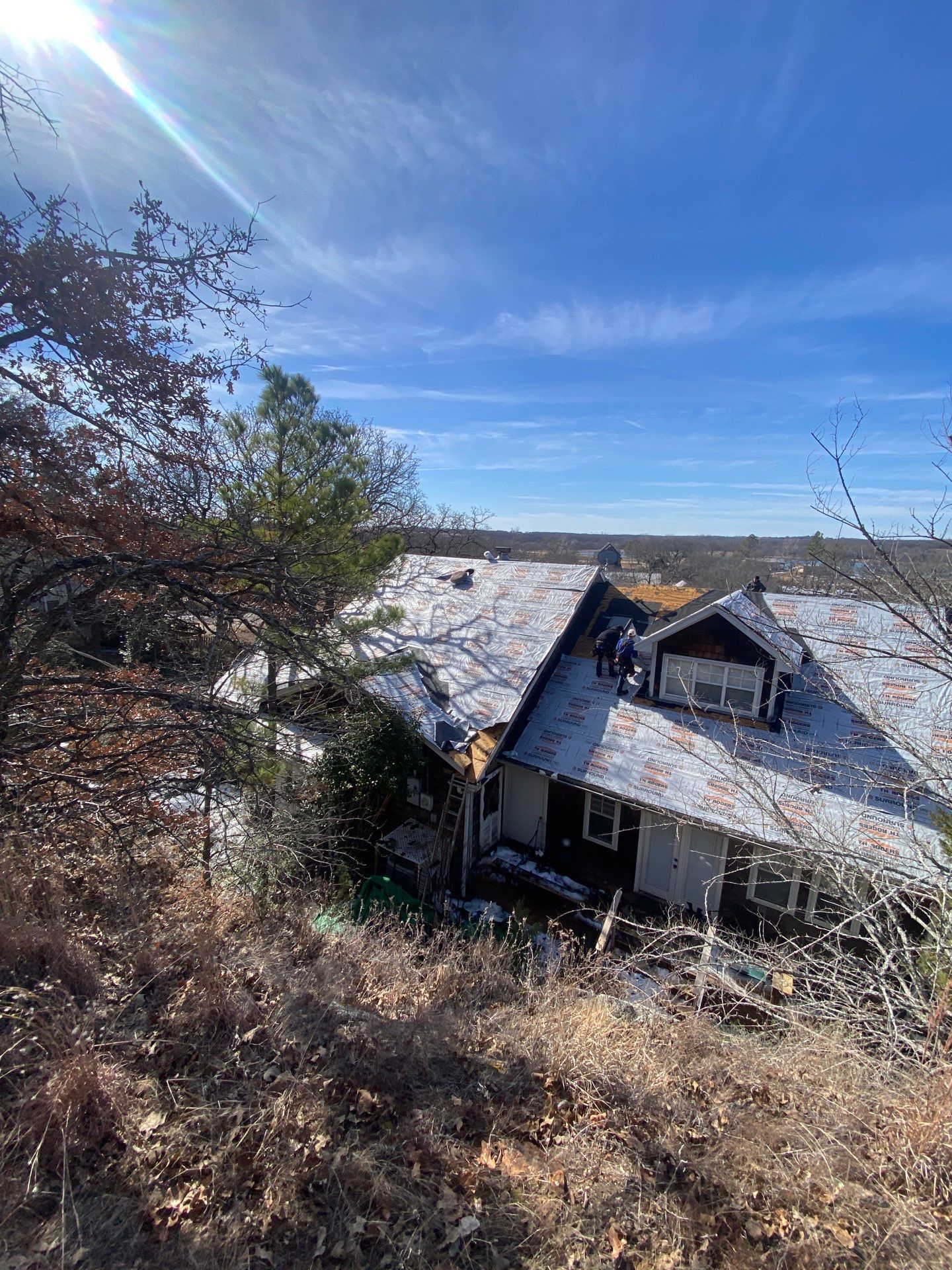 Roof Replacement on a private lake near Ardmore by BANA Roofing and Solar Supply