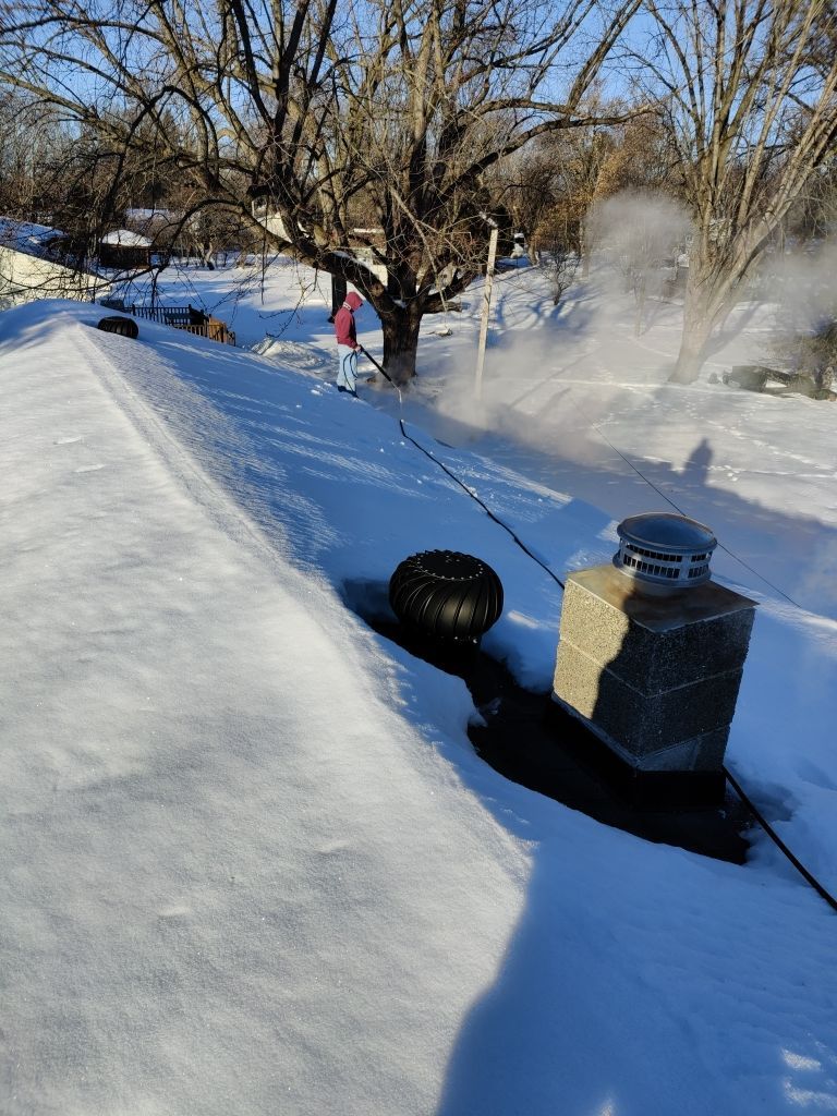 Steaming and Installing New Covers and Heating Cable by Next Level Seamless Gutters / Exteriors Inc.