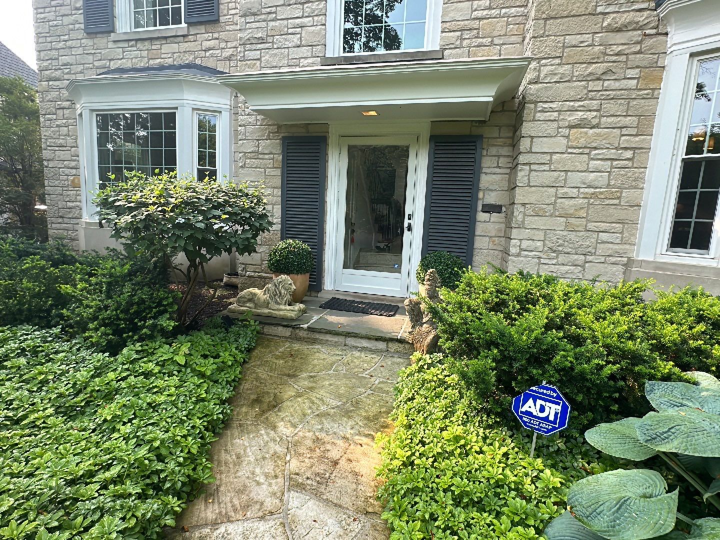 natural stone cleaning using Algaecide, soft wash soap by Northern Power Washing LLC.