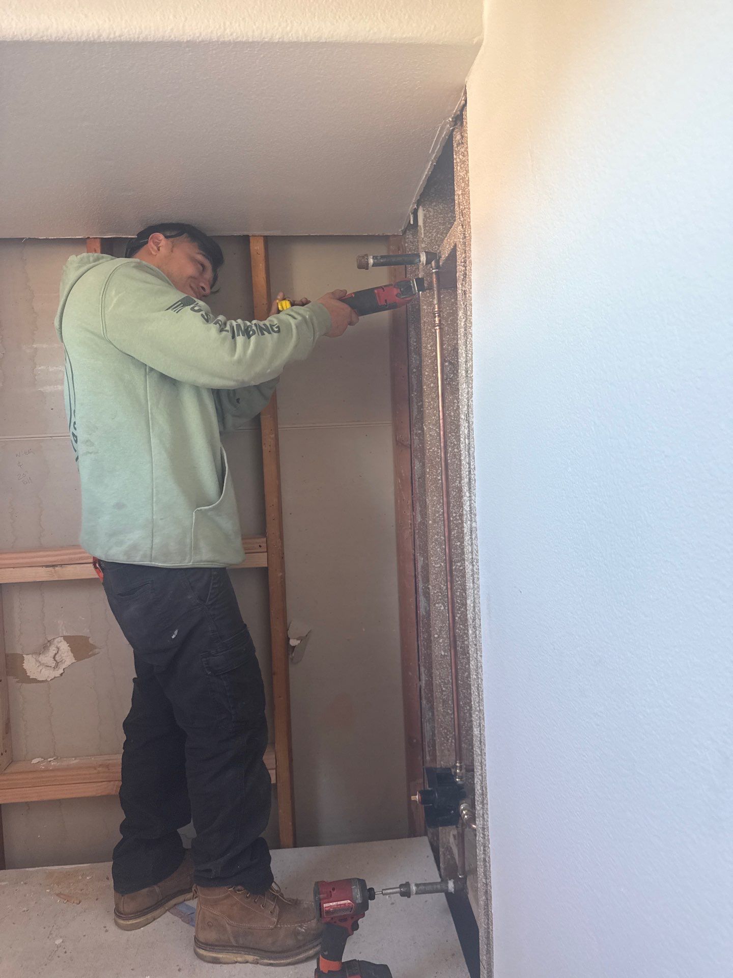 Installing Water Pipe for Shower by Us Plumbing