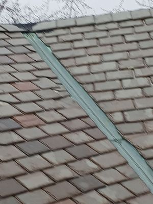 Slate Roof Repair using Slate Tiles