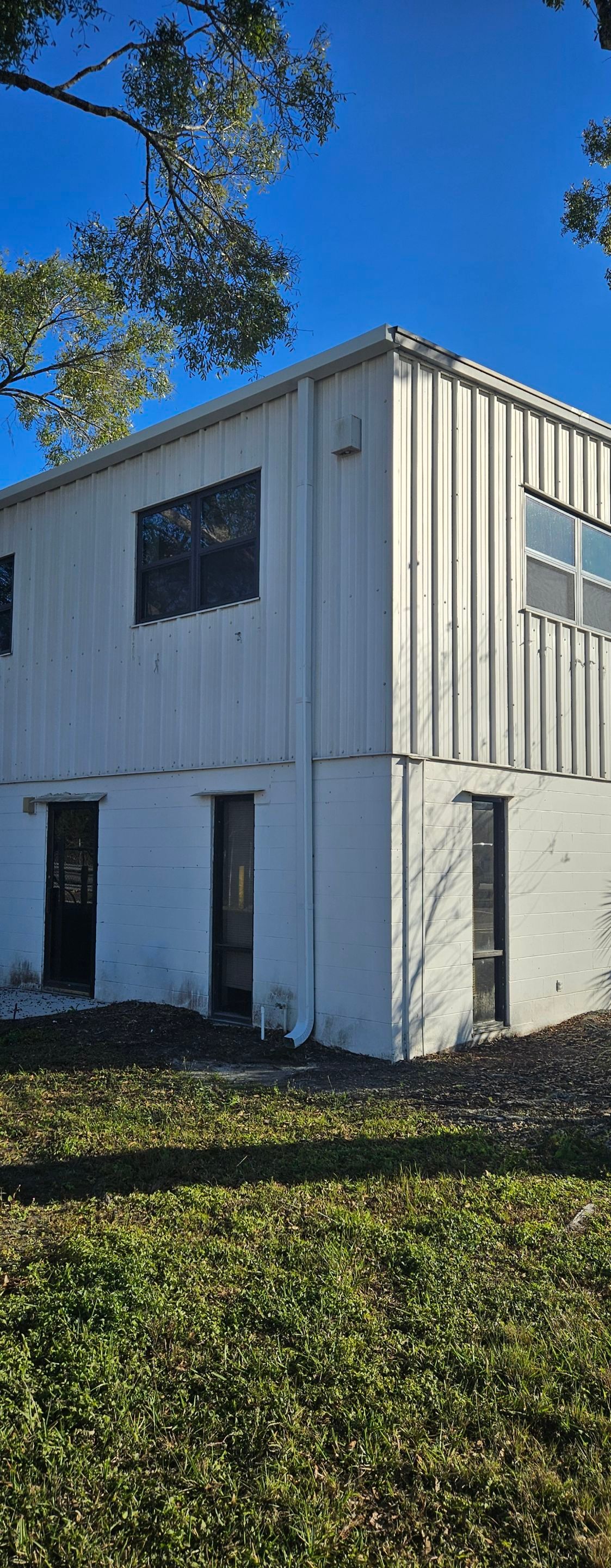 Commercial Gutters using smooth box gutters in Tampa FL by Gutter Professors