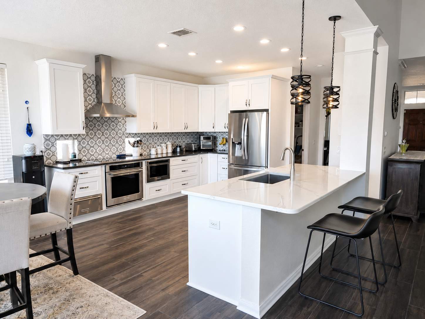 Stone Oak San Antonio Kitchen Remodel Featuring Custom White Cabinetry & Expanded Island by Legacy Bath and Kitchen 