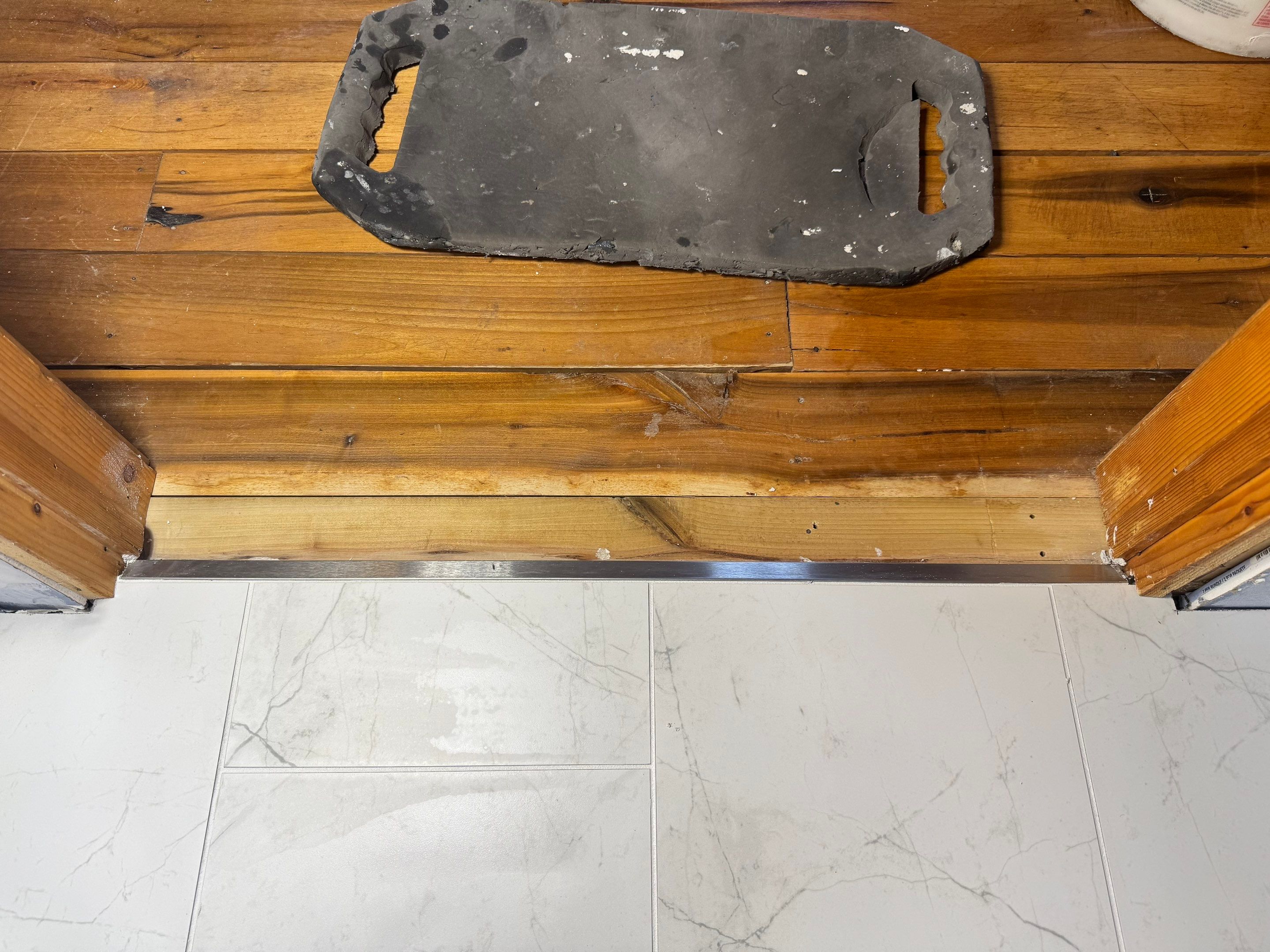 Brandt Double Bathroom Remodel by Integrity Tile and Home LLC