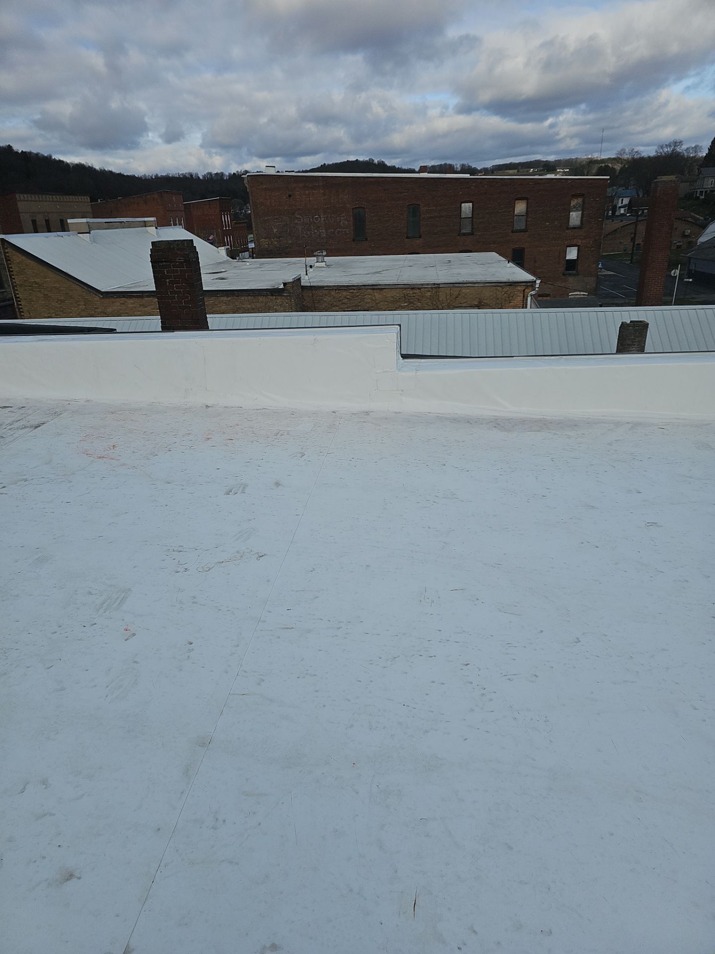 Western Auto  by 768 ROOF, LLC.