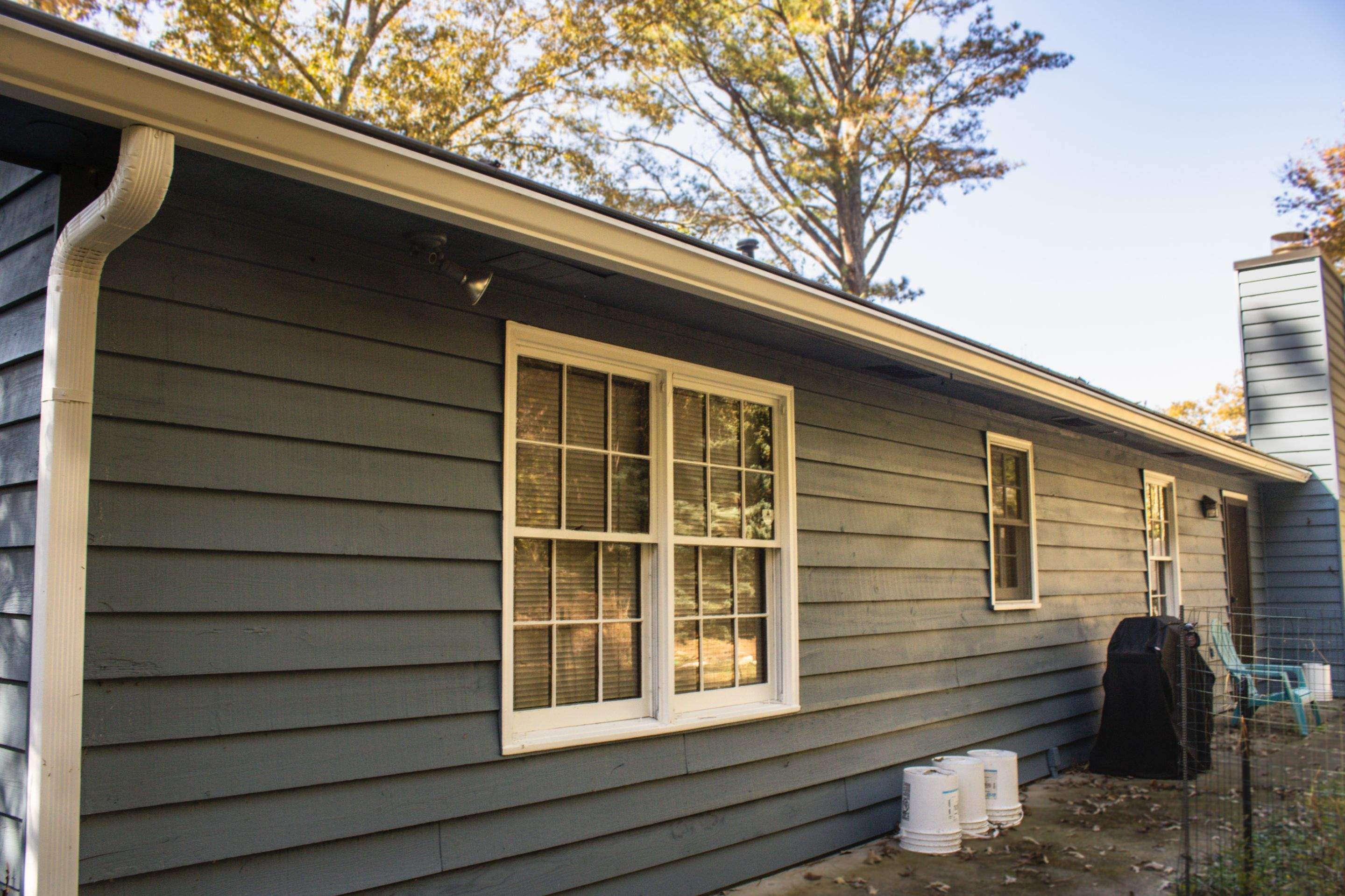 Marietta, GA Exterior Painting Transformation with Blue Paint by Nelson Exteriors