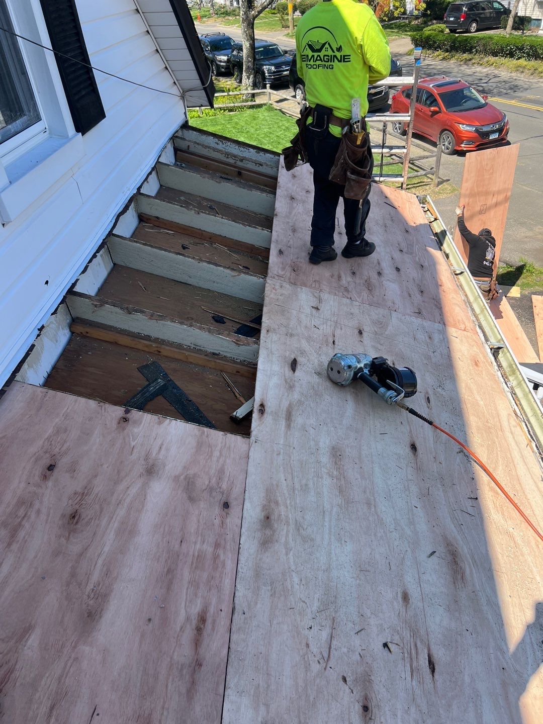 Charcoal Shingles by Reimagine Roofing