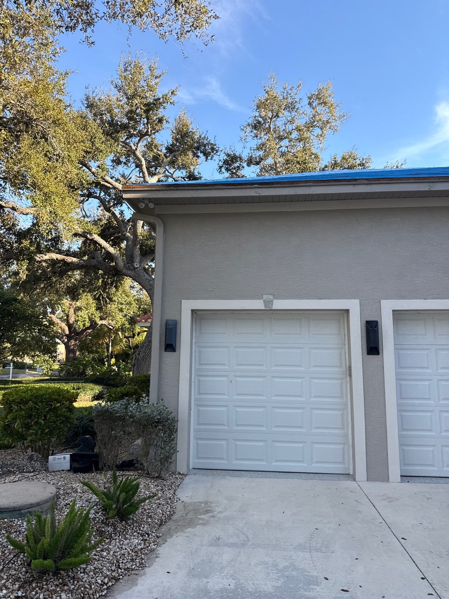 Soffit and Fascia Installation and black seamless gutters in Sarasota FL by Gutter Professors