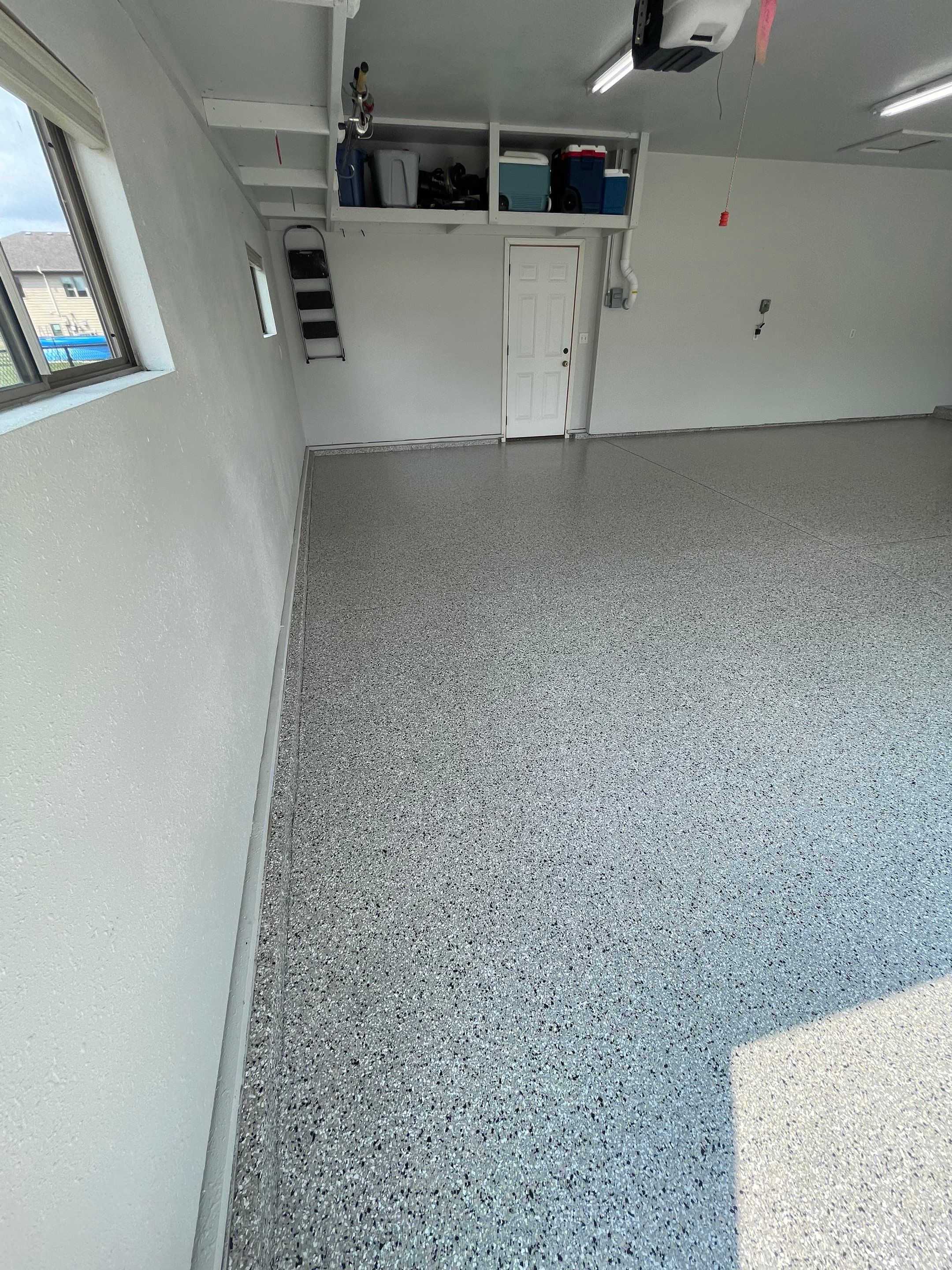 Multi-Car Garage Floor Coating and Crack Repair in Tea by Select Painting, Coatings & Garage Cabinets