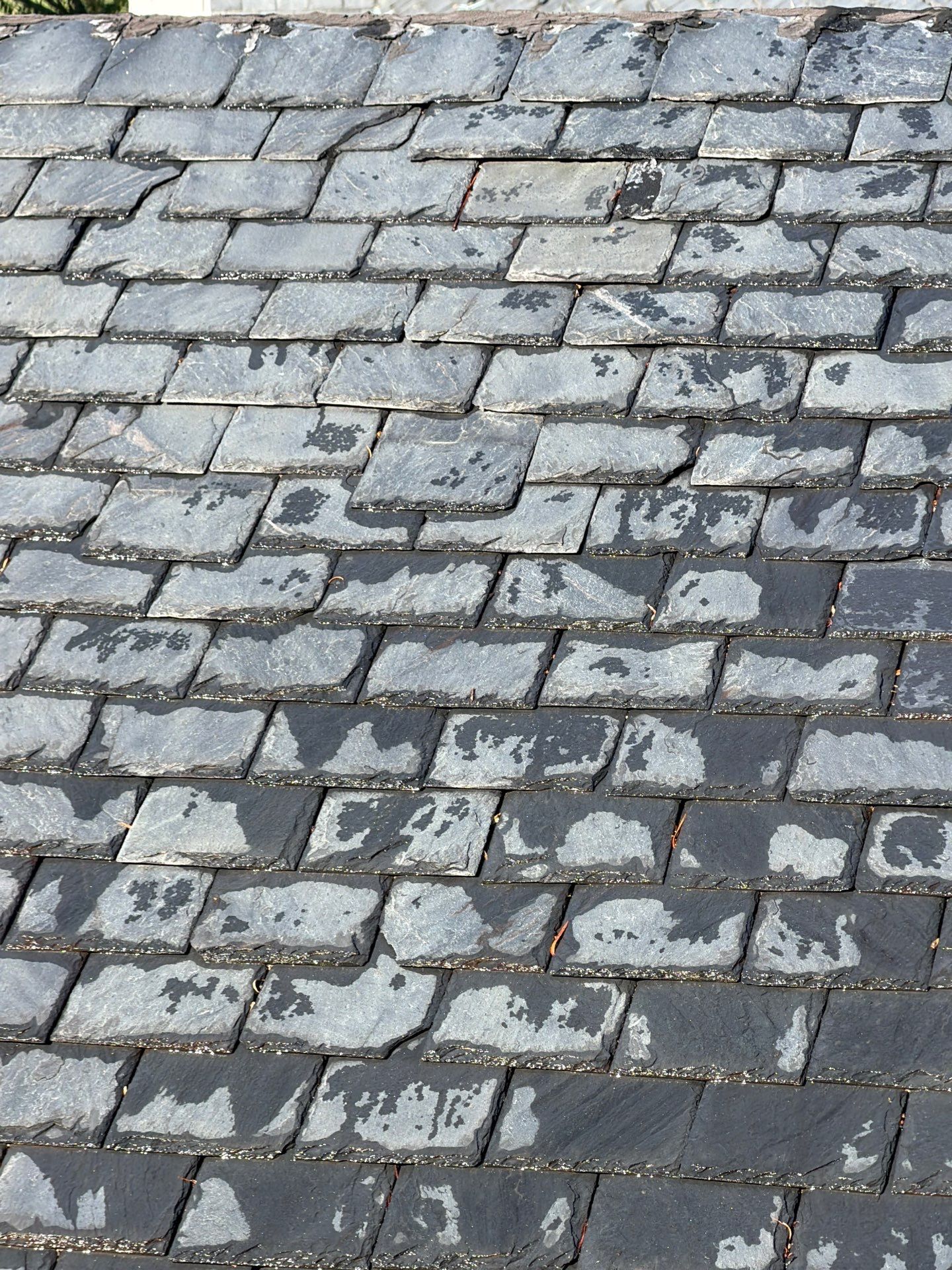 Historical Slate Roof Repair and Chimney Flashing Restoration in West Point by Cade Construction