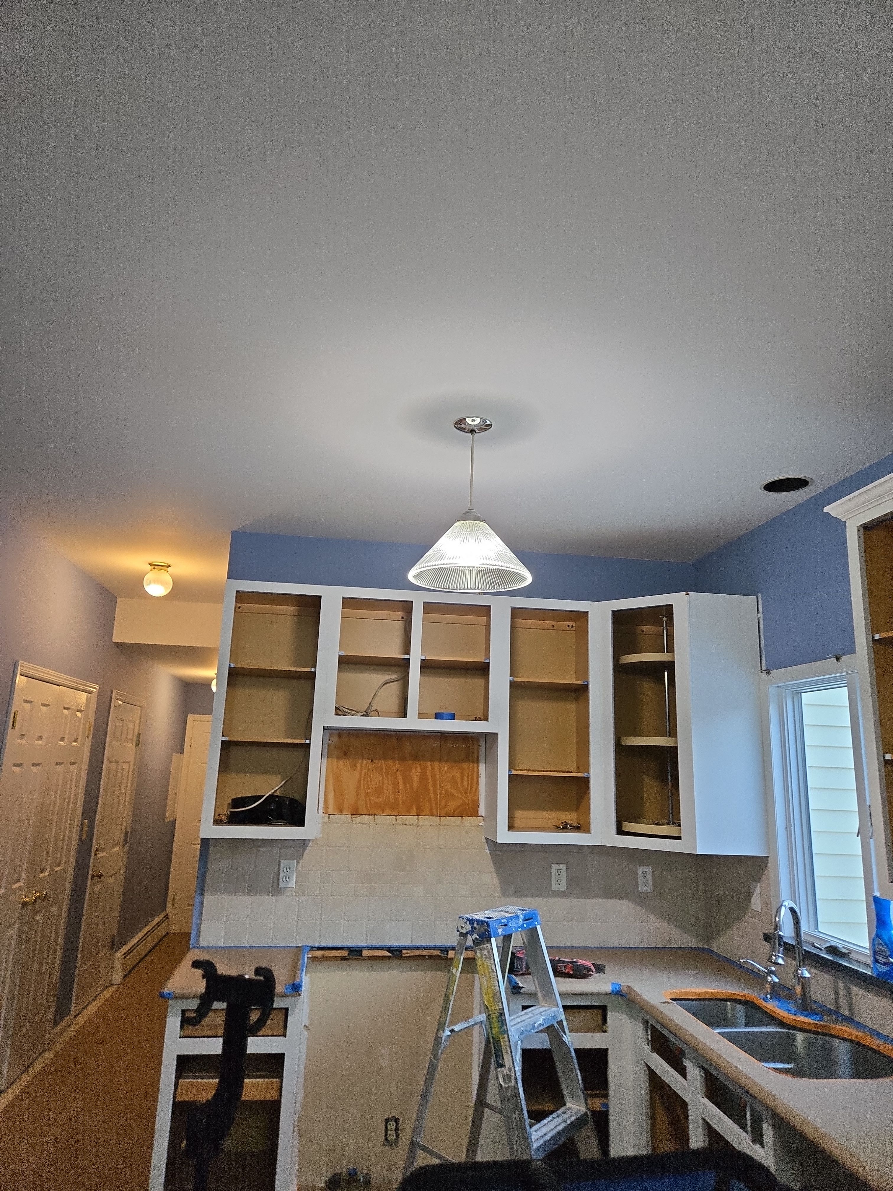 Cabinet Refinishing using Benjamin Moore Command by Spectrum Painting, LLC