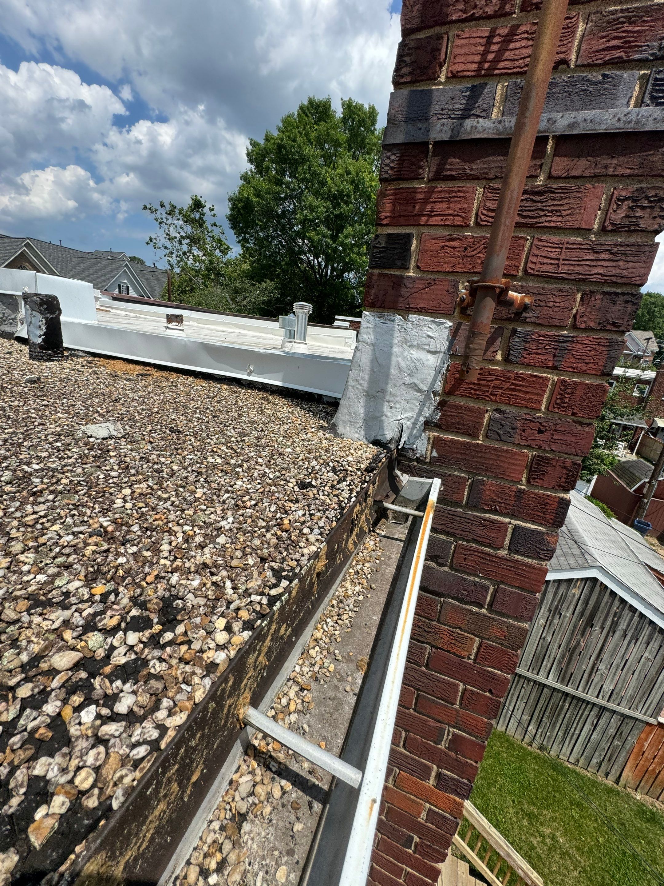 Townhouse Flat Roof Replacement using Carlisle TPO System by USA Storm Roofing and Construction Group