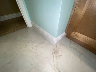 Baseboard Installation using Primed Pine Baseboard Moulding