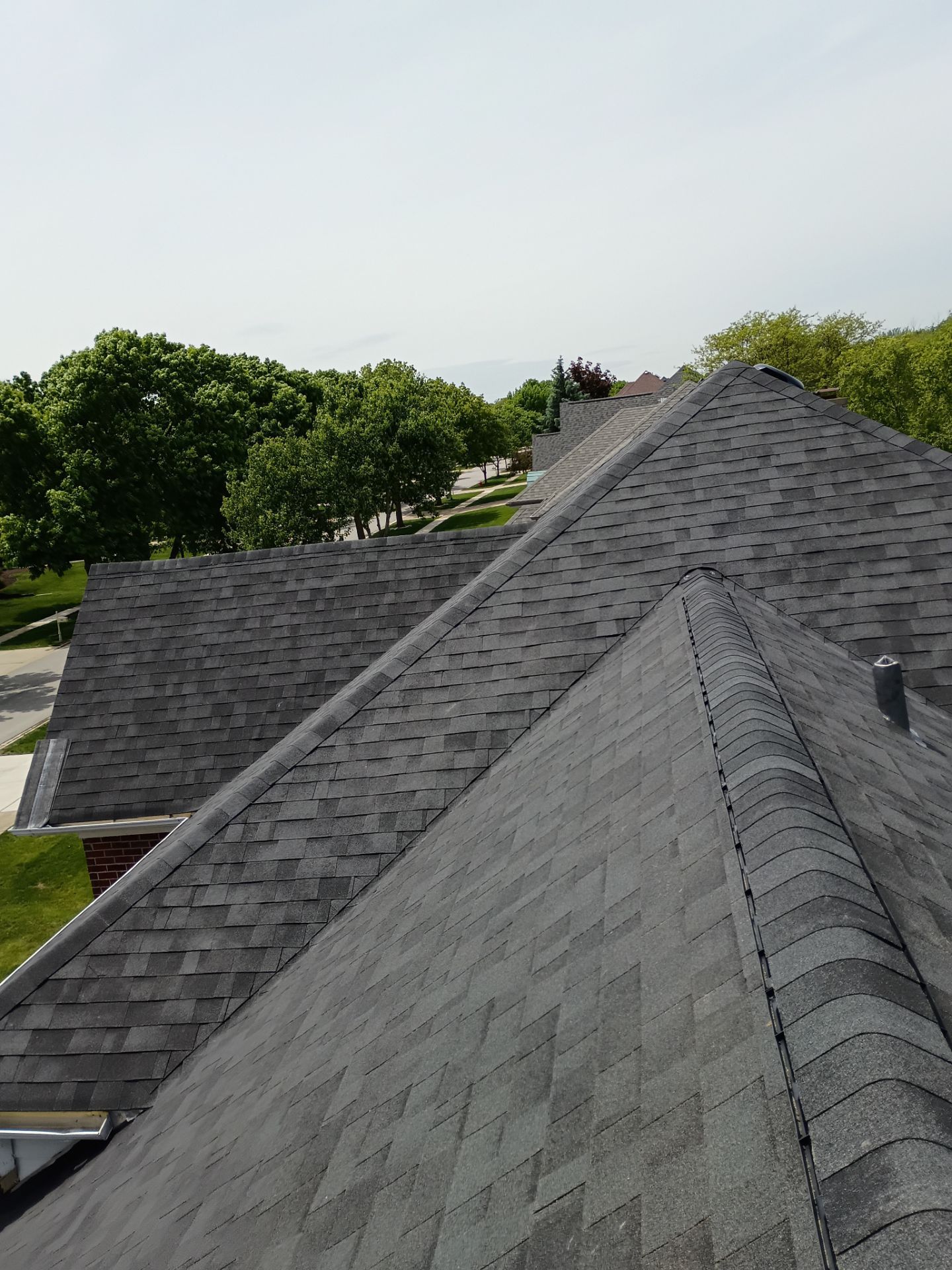 Asphalt Shingle Roof Replacement and Skylight Installation in Darien by Pro Home Services Inc