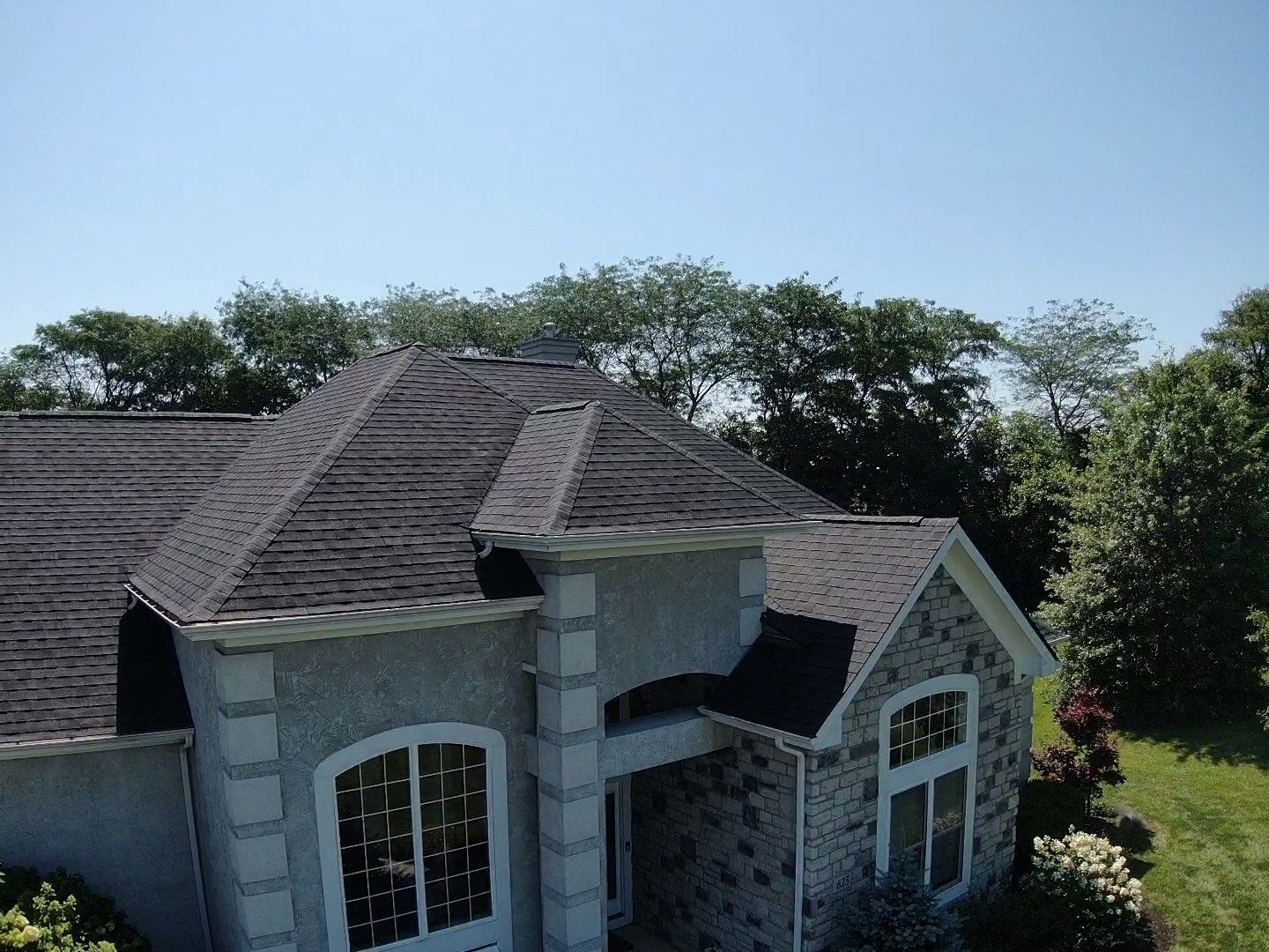Residential Roofing Installation using Atlas Pinnacle Black Shingles by 614 Exteriors