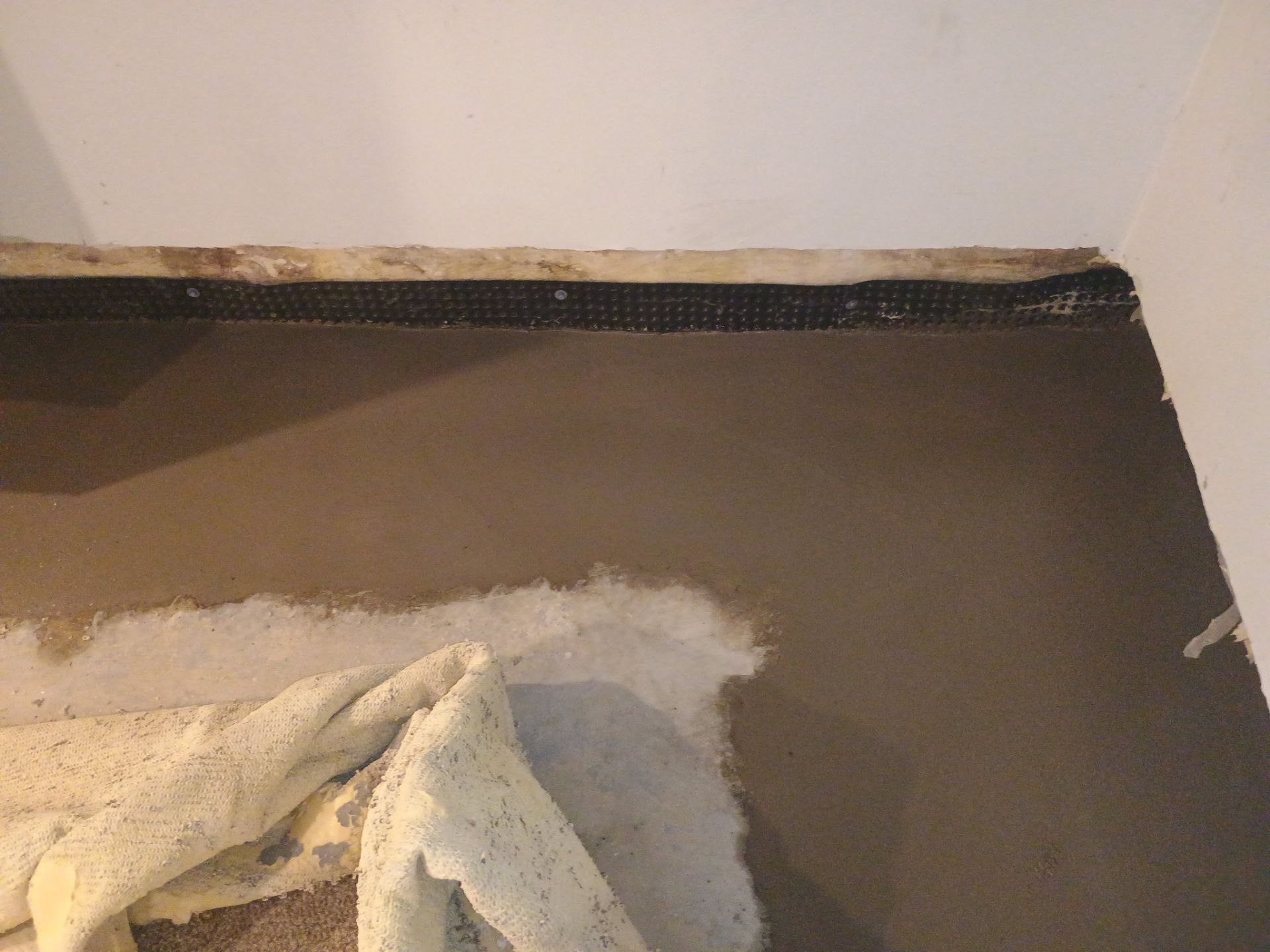 Interior Drain Tile Installation in South Minneapolis by Waterproofing Northeast