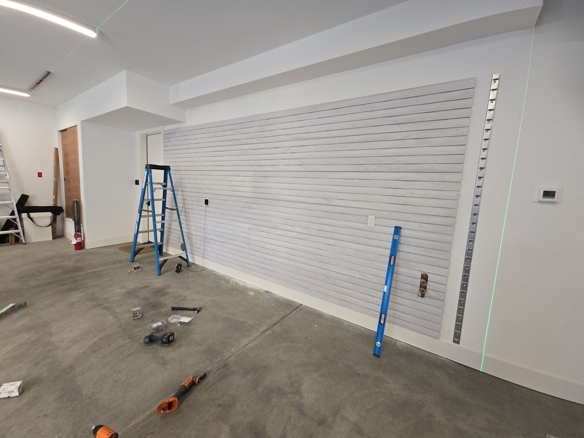 Garage Transformation using Pebble Beach by Croc Coatings, LLC