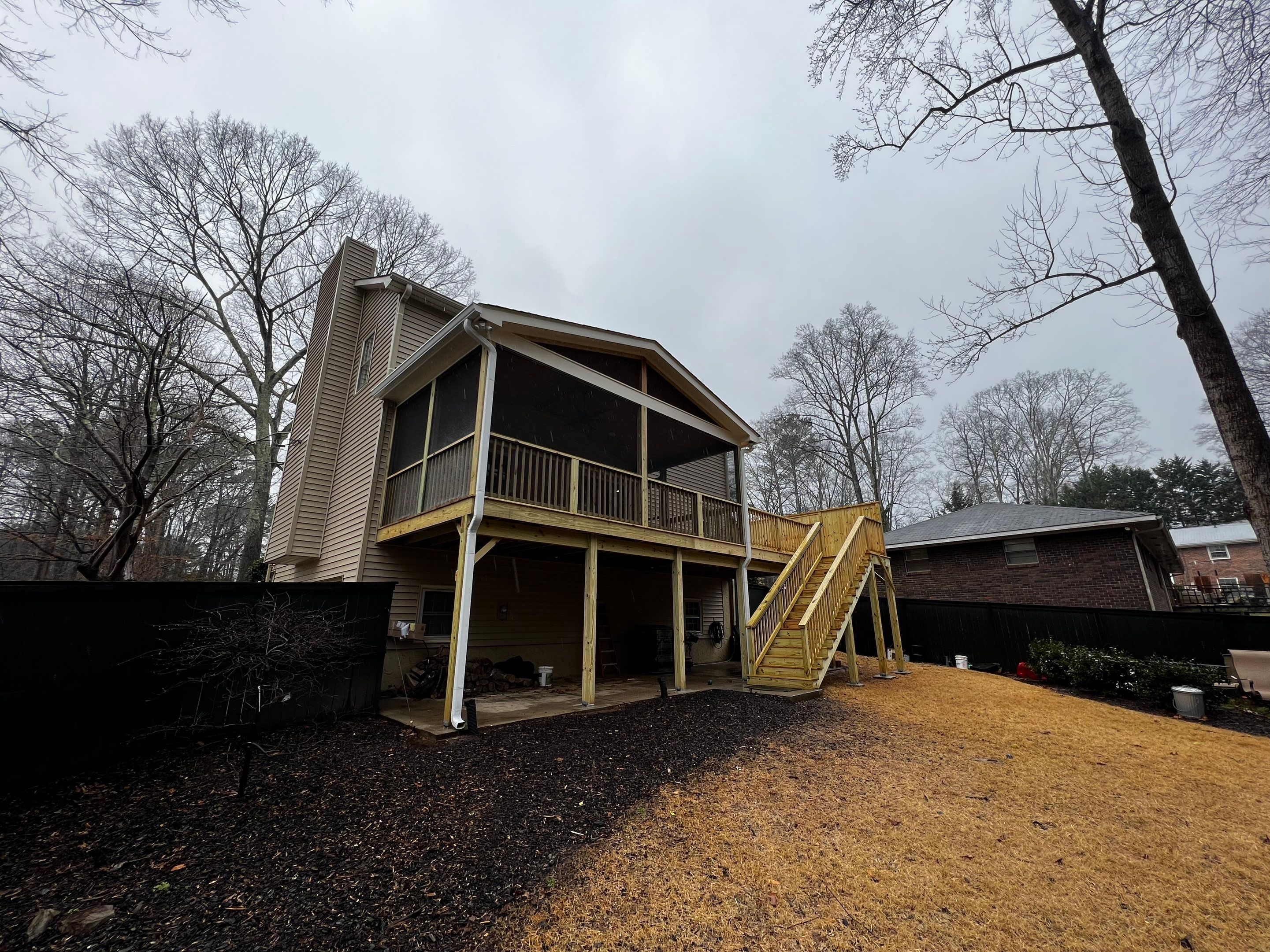 Custom Screened-In Porch and Elevated Deck Construction in Smyrna by Swift Home Renovations