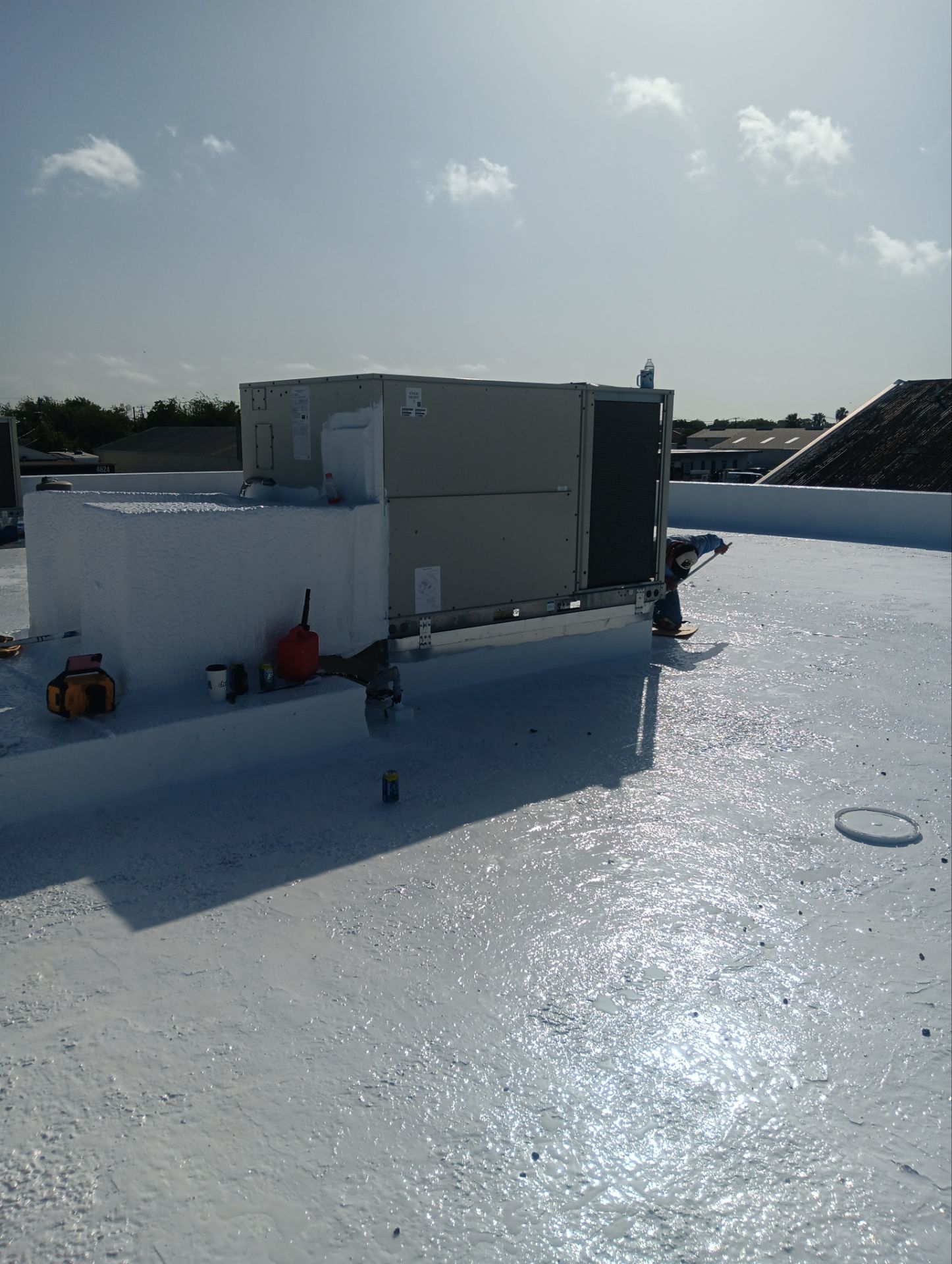 Dirty leaking Gravel Roof by Bayfront Roofing and Construction