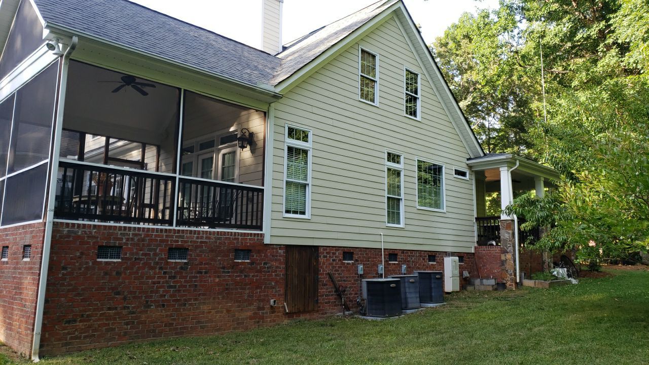 House Wash using cleaner by Power Wash Masters LLC